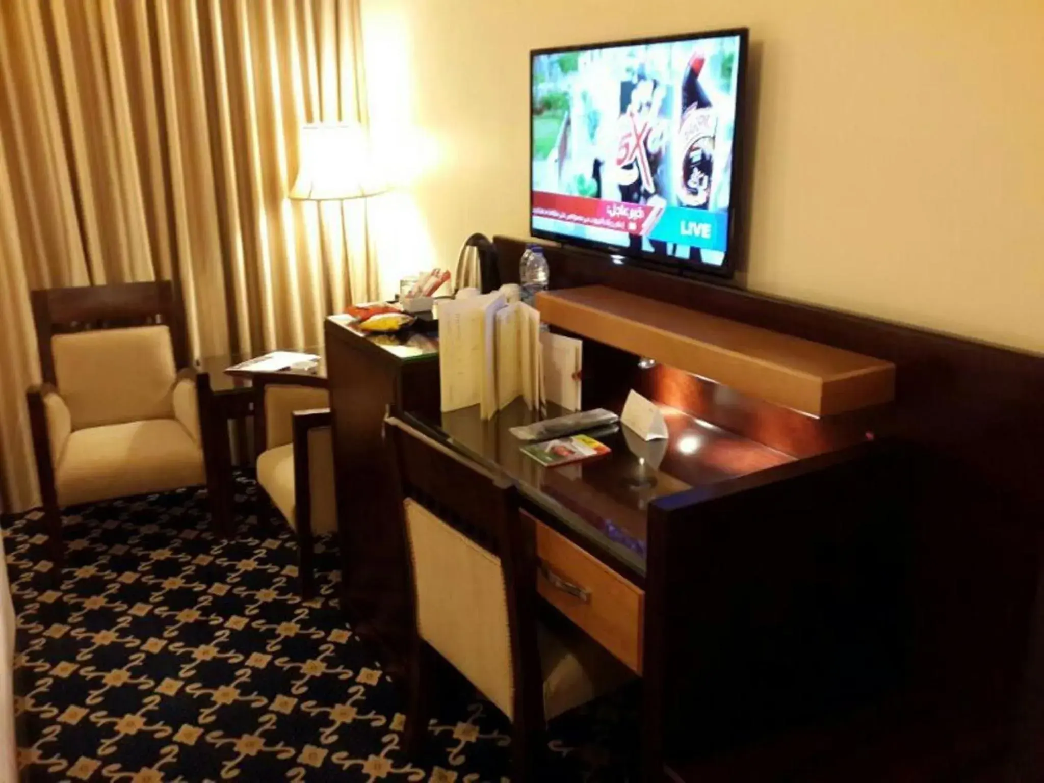 TV and multimedia, TV/Entertainment Center in Al Thuraya Hotel