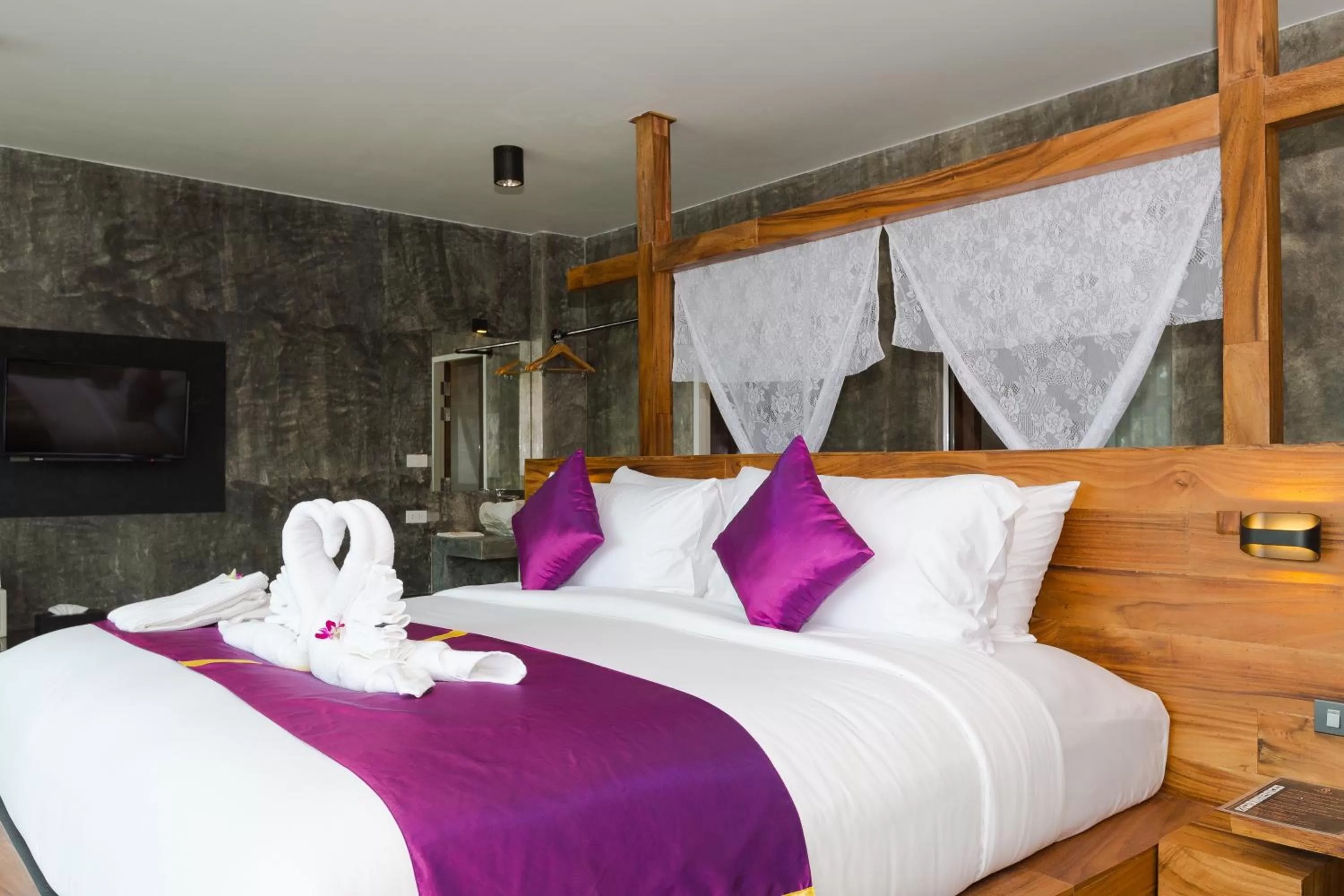 Bed in Maneetel Krabi Beachfront-SHA Plus