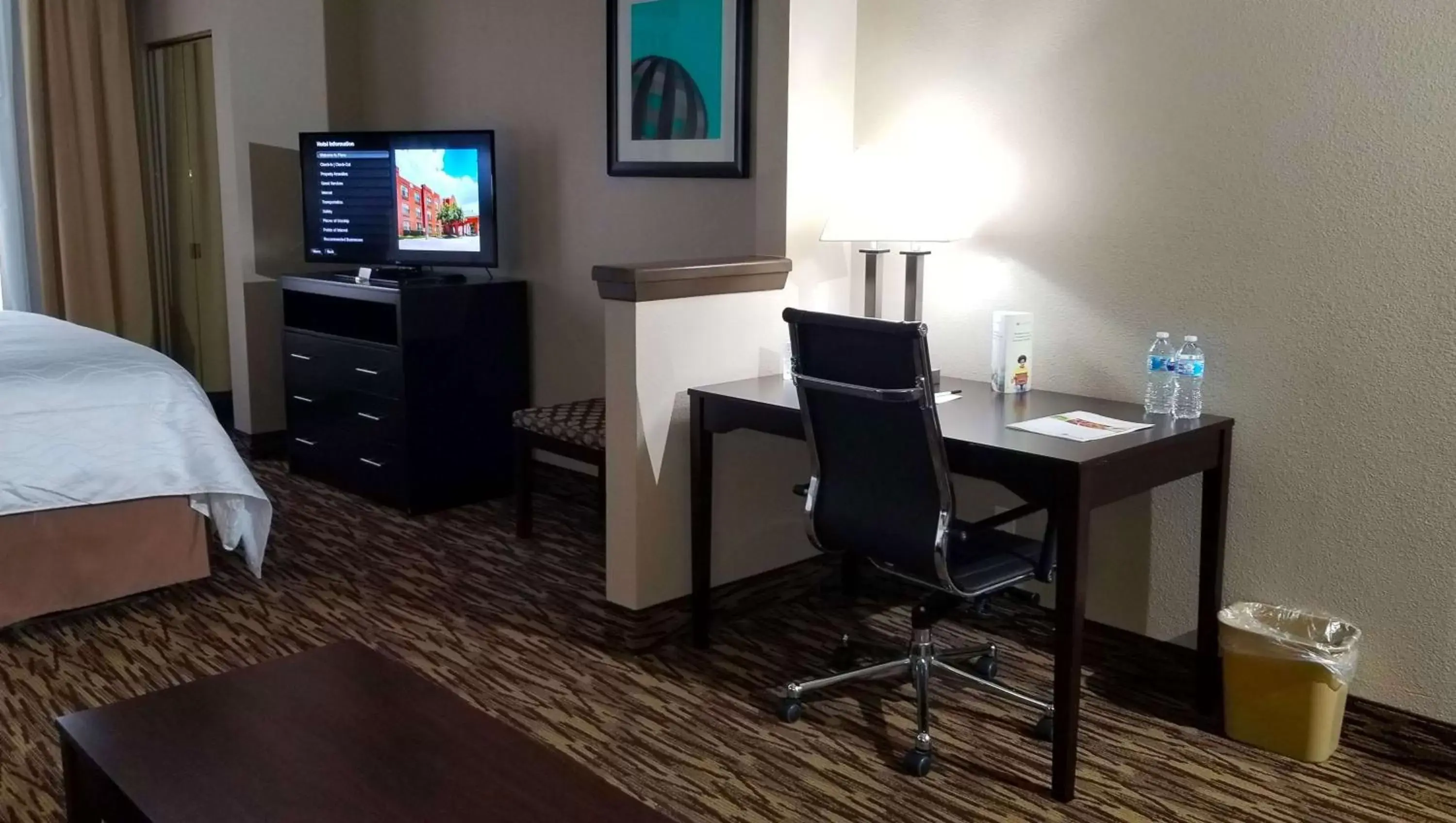 Photo of the whole room, TV/Entertainment Center in SureStay Plus Hotel by Best Western Plano