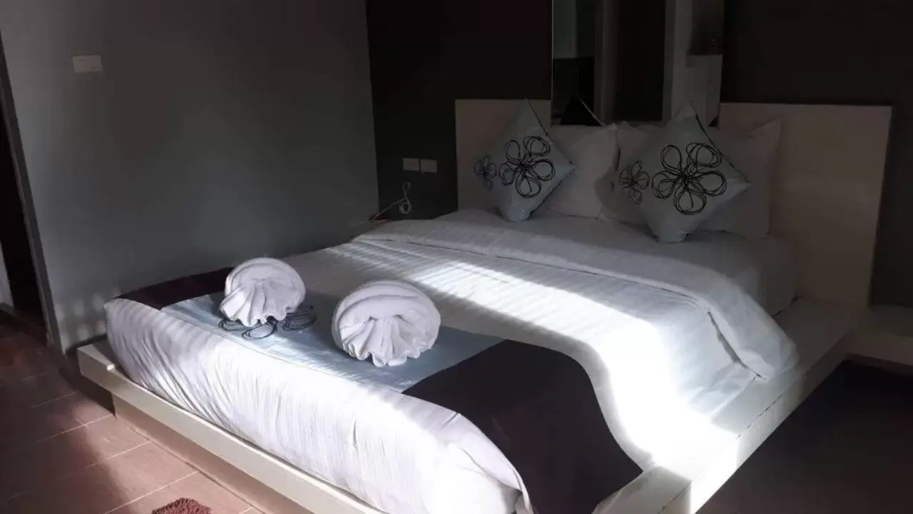 Bed in Panlaan Boutique Resort