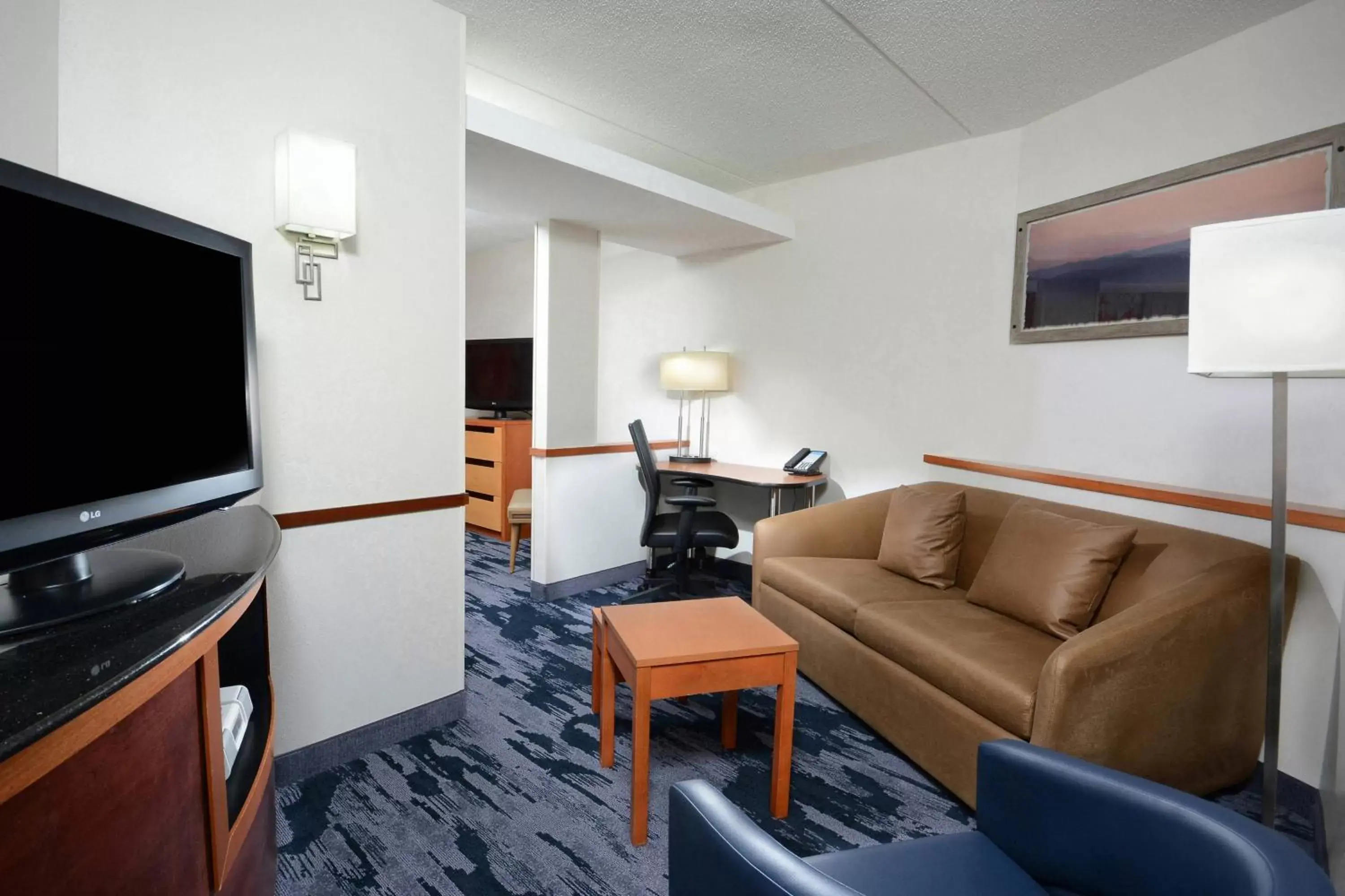 Photo of the whole room, TV/Entertainment Center in Fairfield Inn & Suites by Marriott Charlottesville North