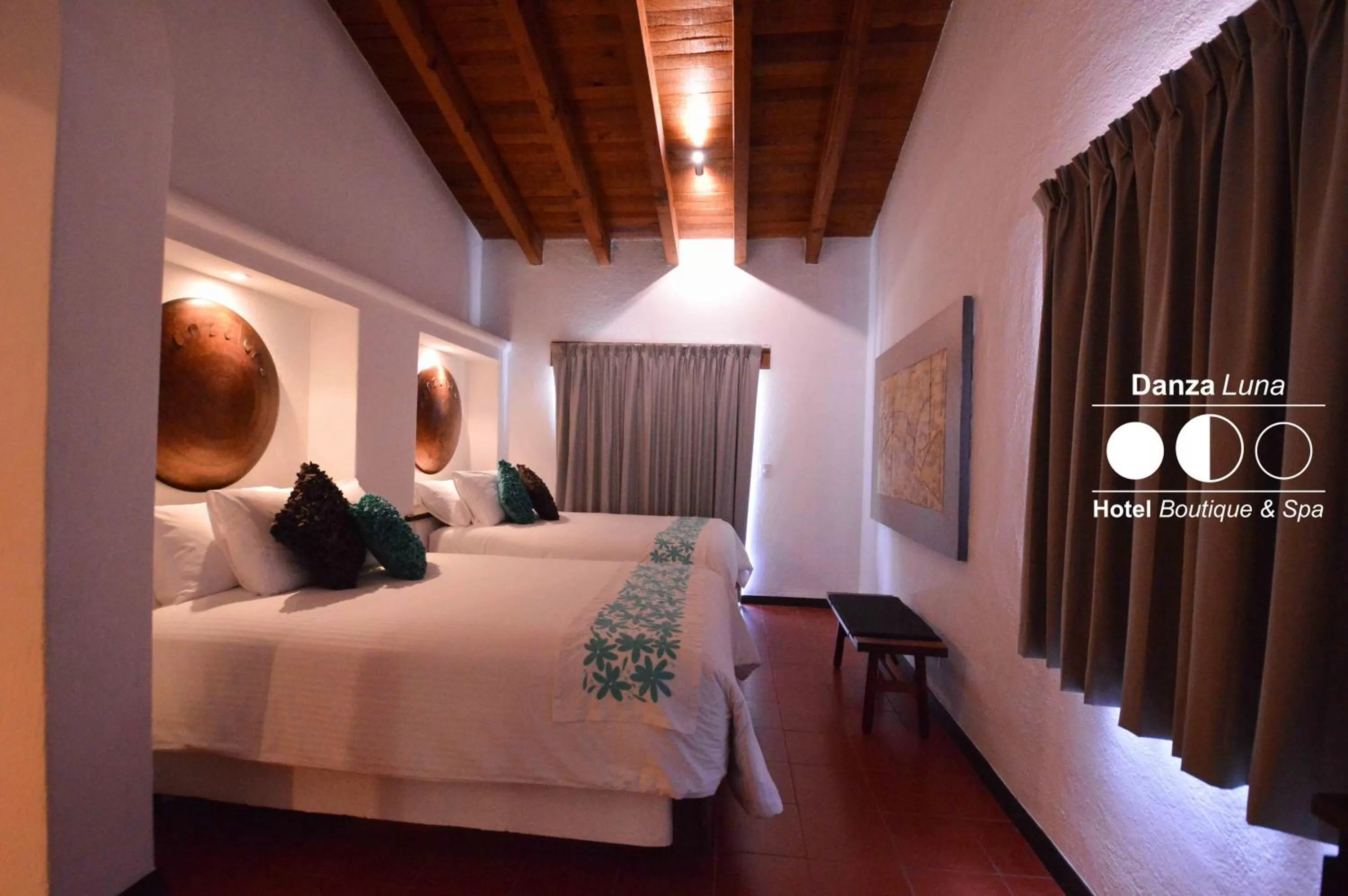 Bed in Danzaluna Hotel Boutique