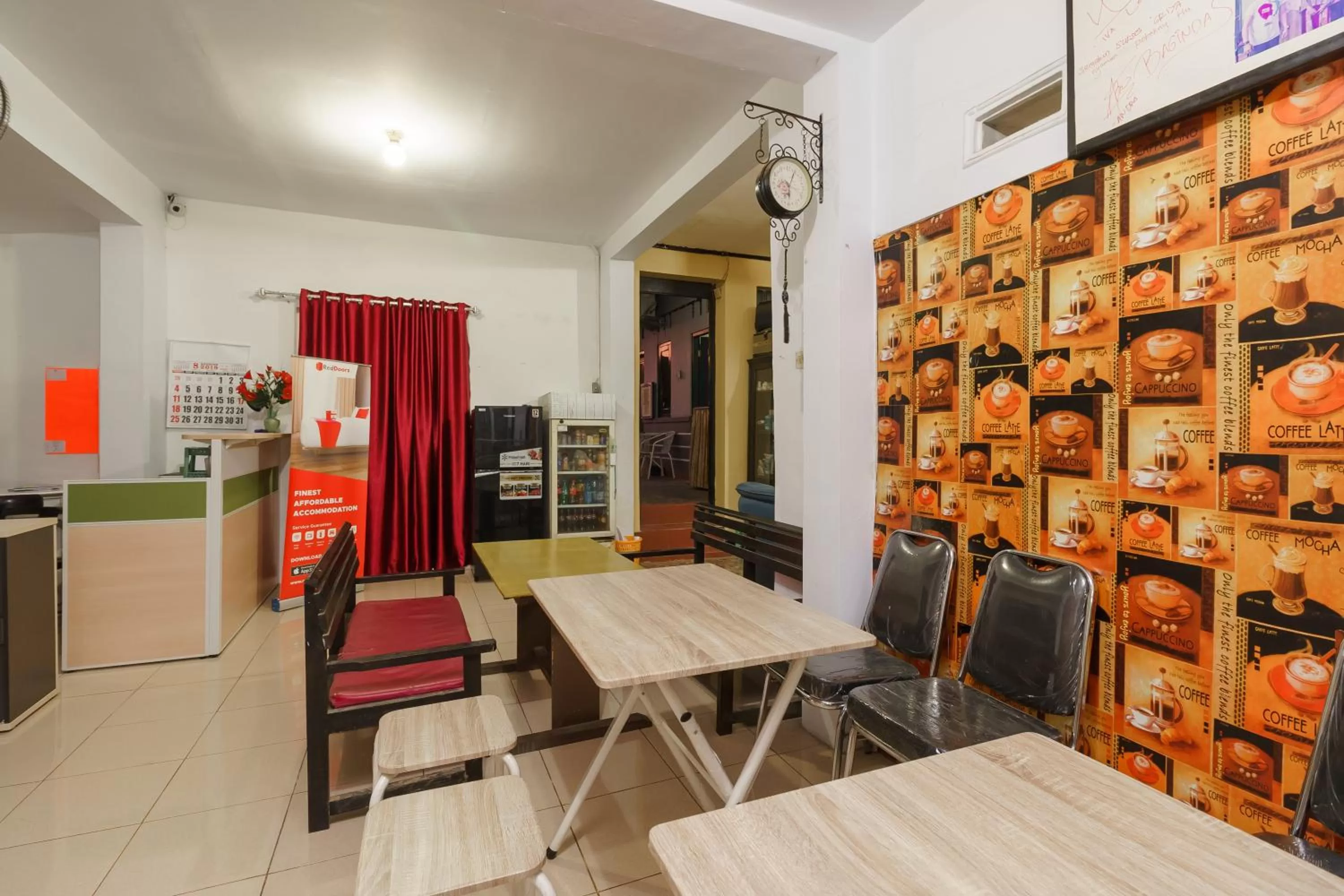 Living room in RedDoorz Syariah near Ciledug Station