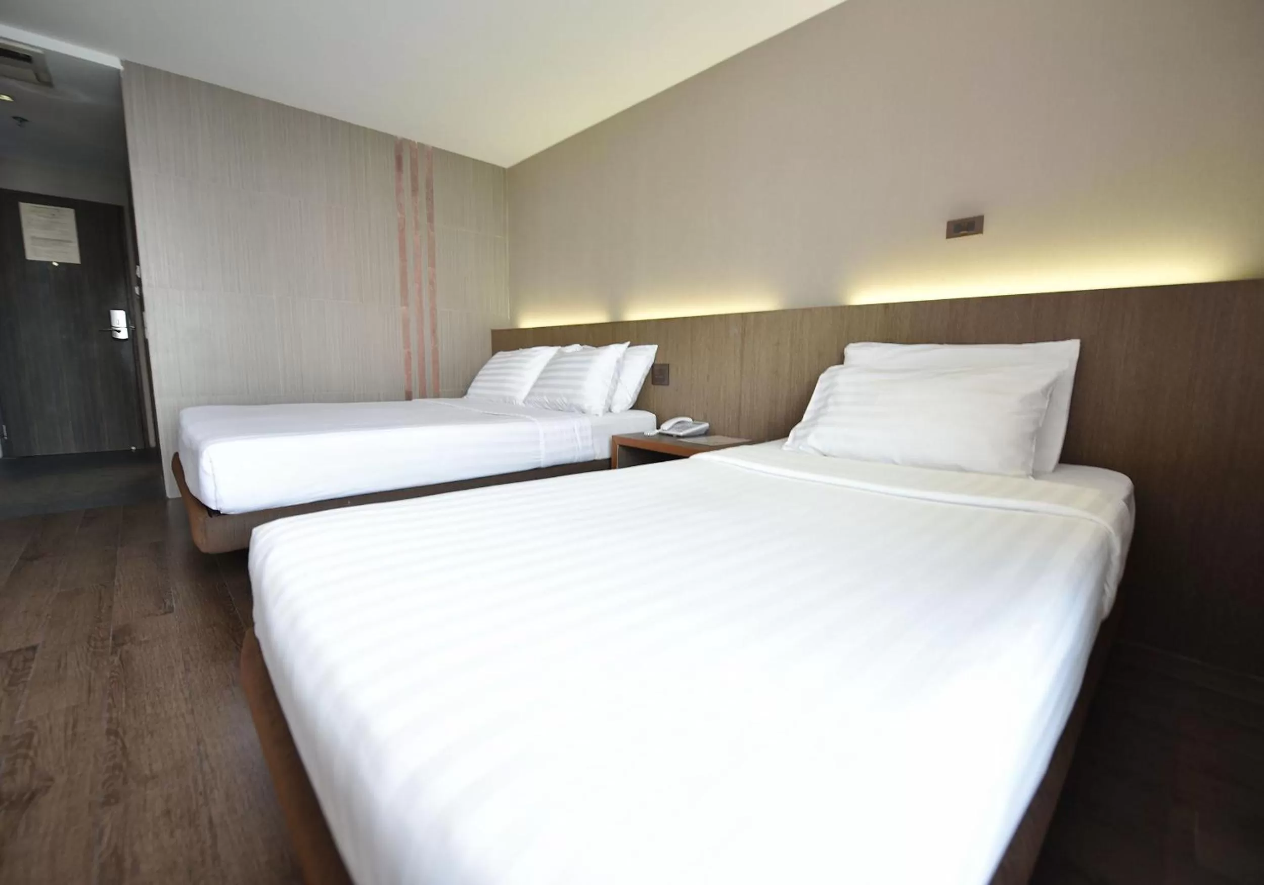 Bed in Bangkok City Hotel