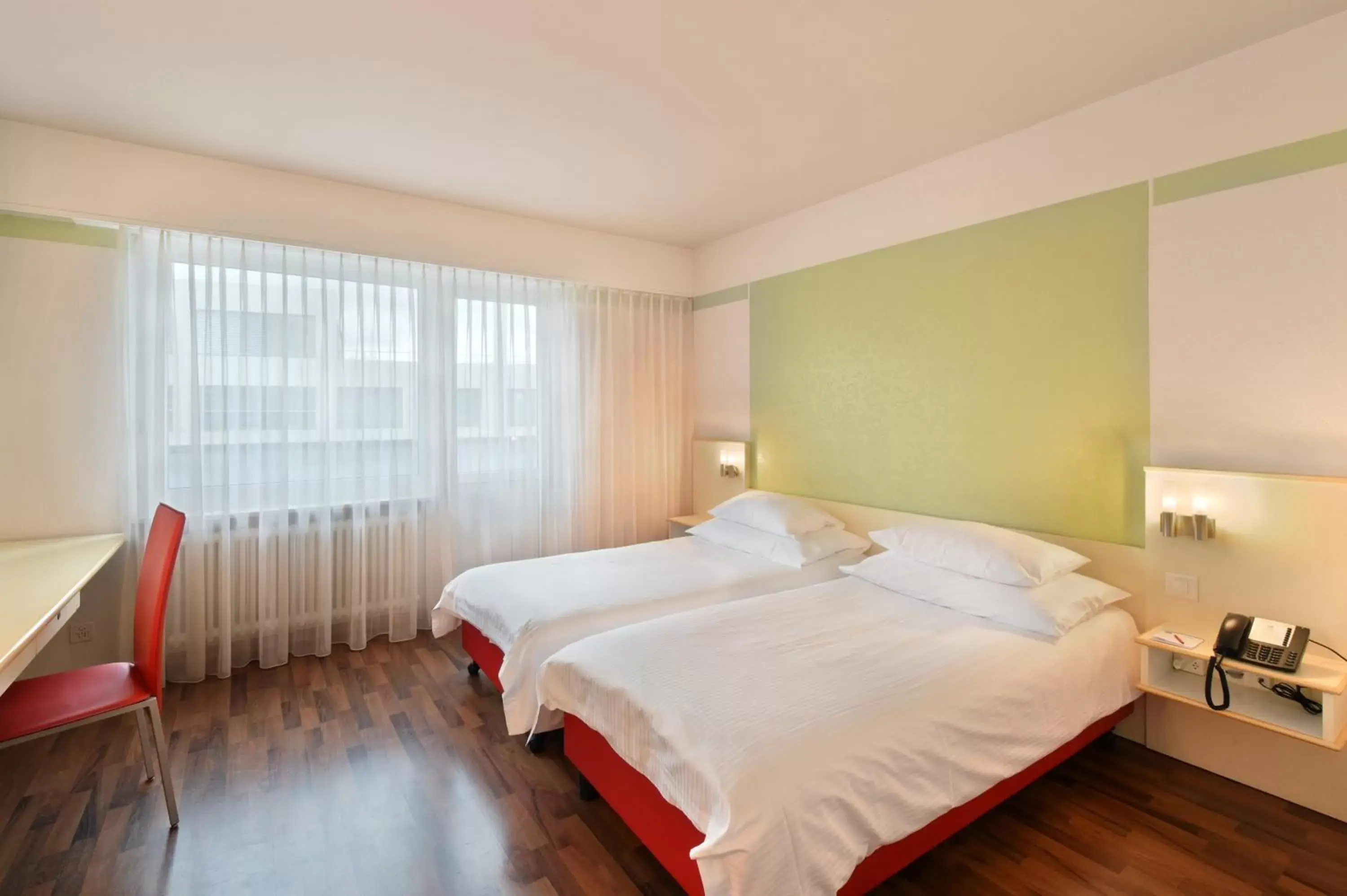 Photo of the whole room, Bed in City Hotel Biel Bienne Free Parking