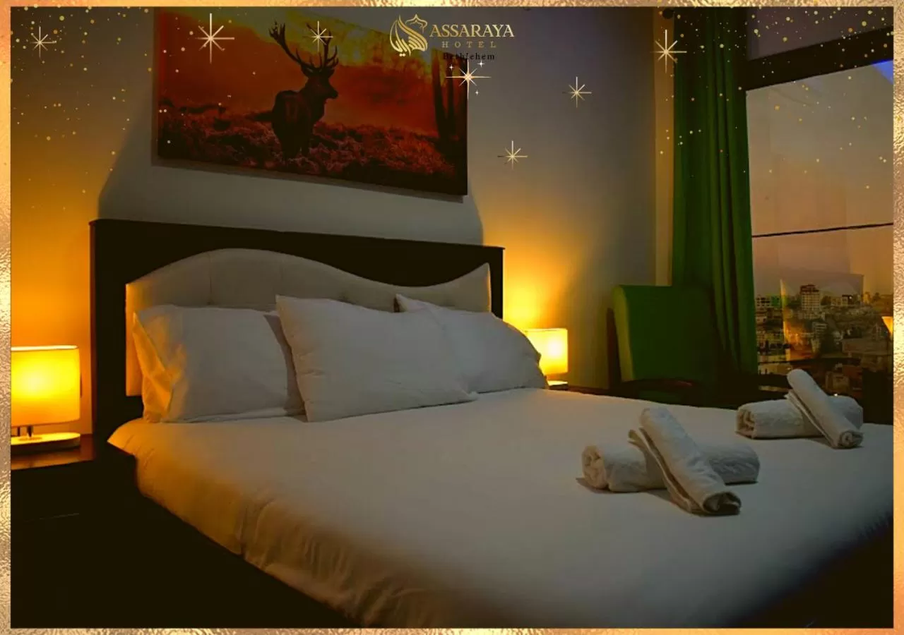 Bed in Assaraya Palace Hotel