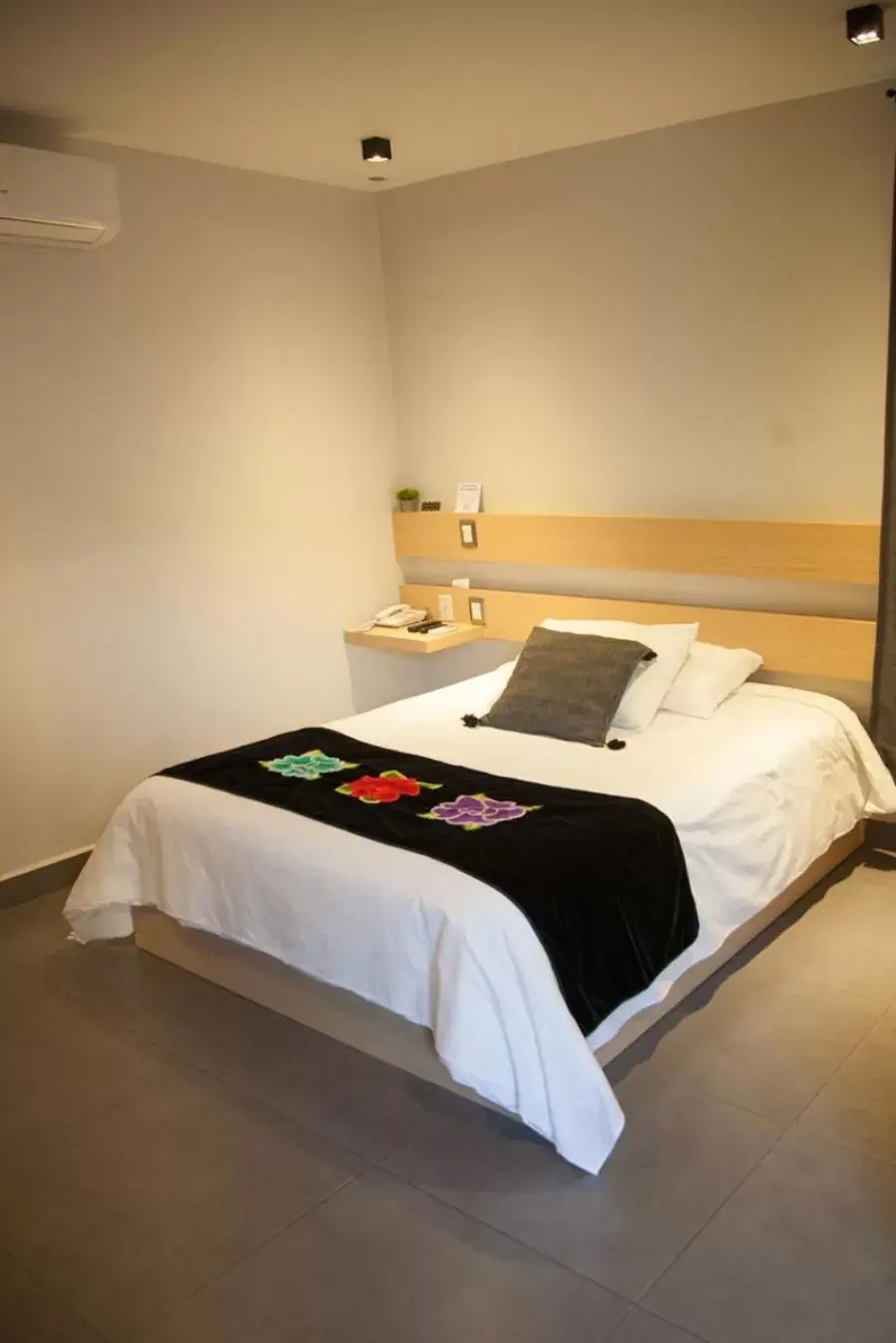 Bed in Maria Ines Hotel Suite
