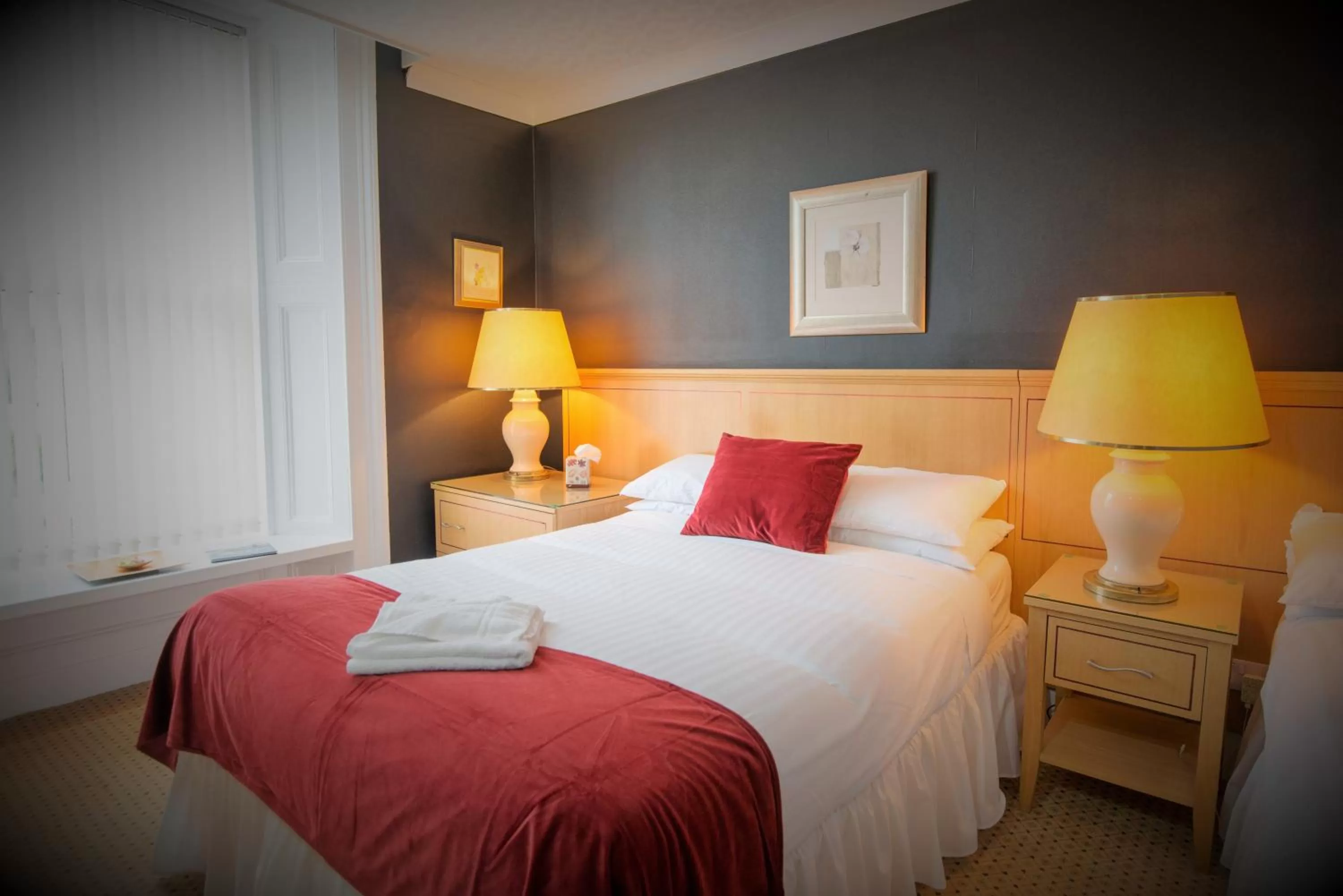 Photo of the whole room, Bed in Caledonian Hotel