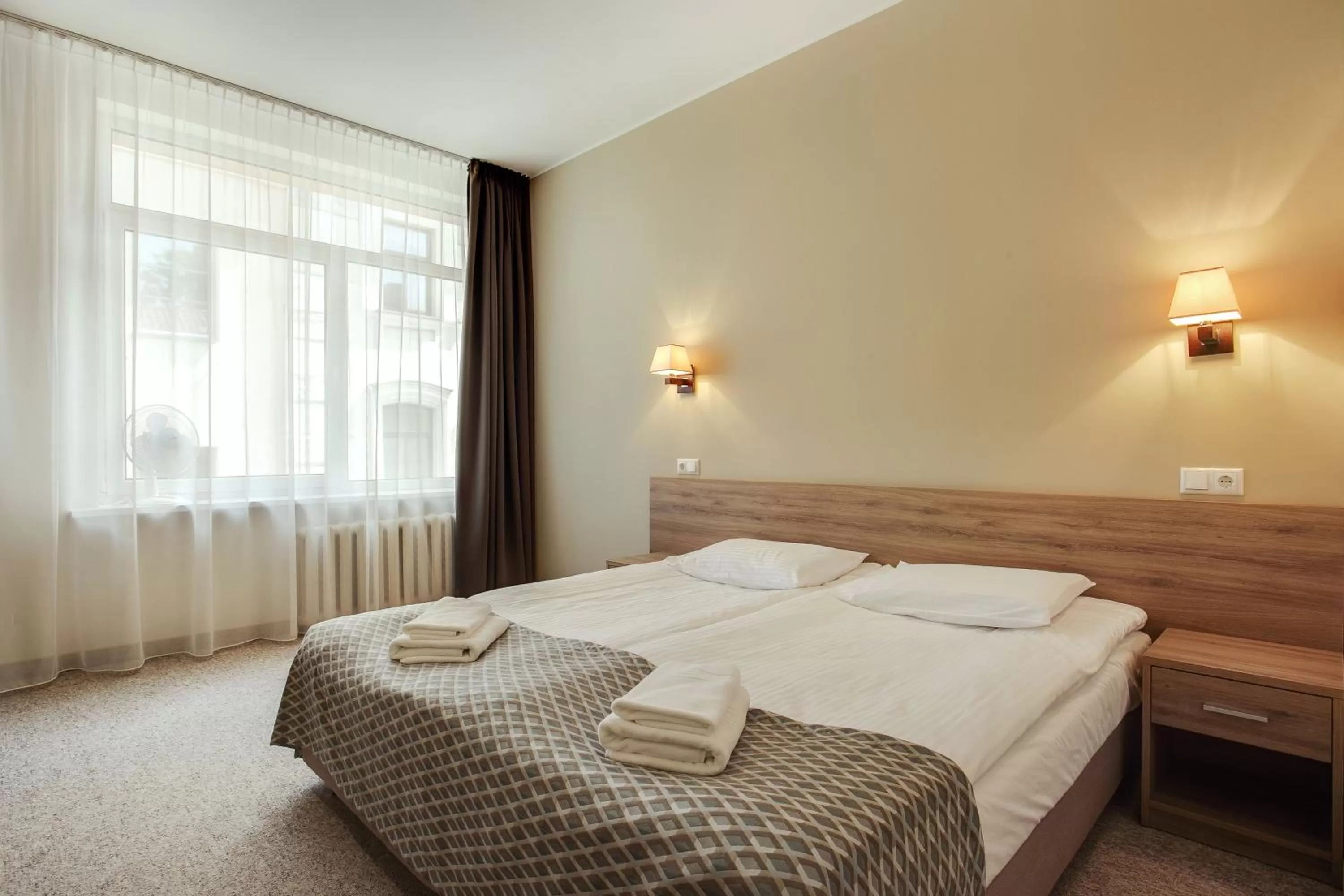 Photo of the whole room, Bed in Old Town Trio