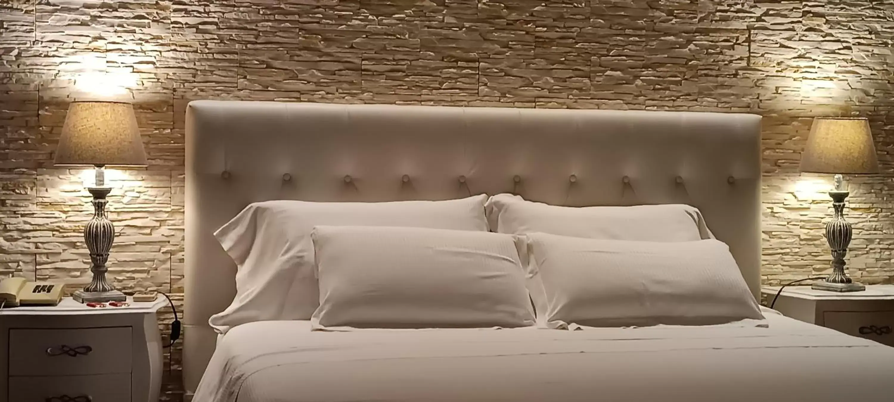 Bed in Hotel Palladium