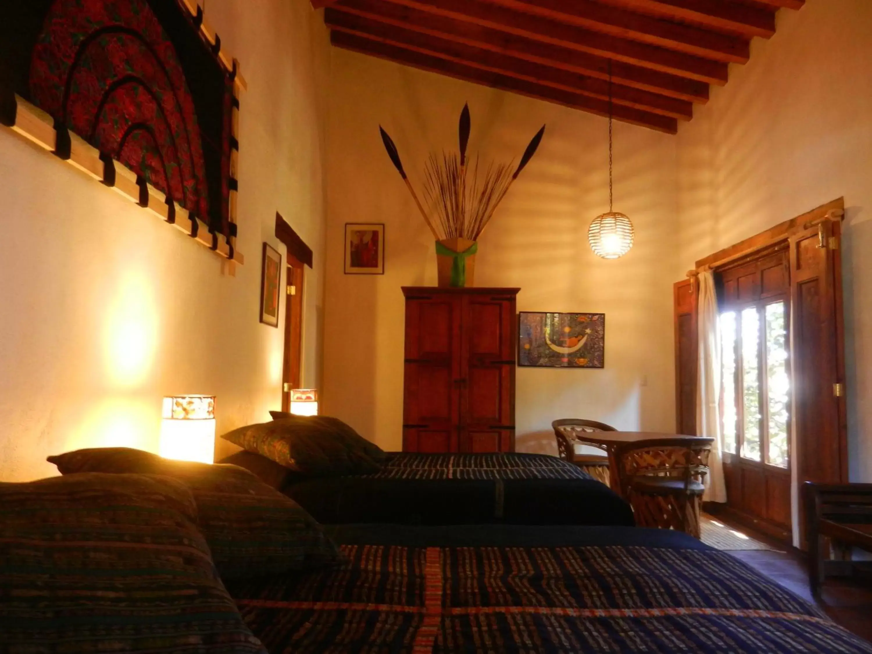 Photo of the whole room, Bed in Posada Yolihuani