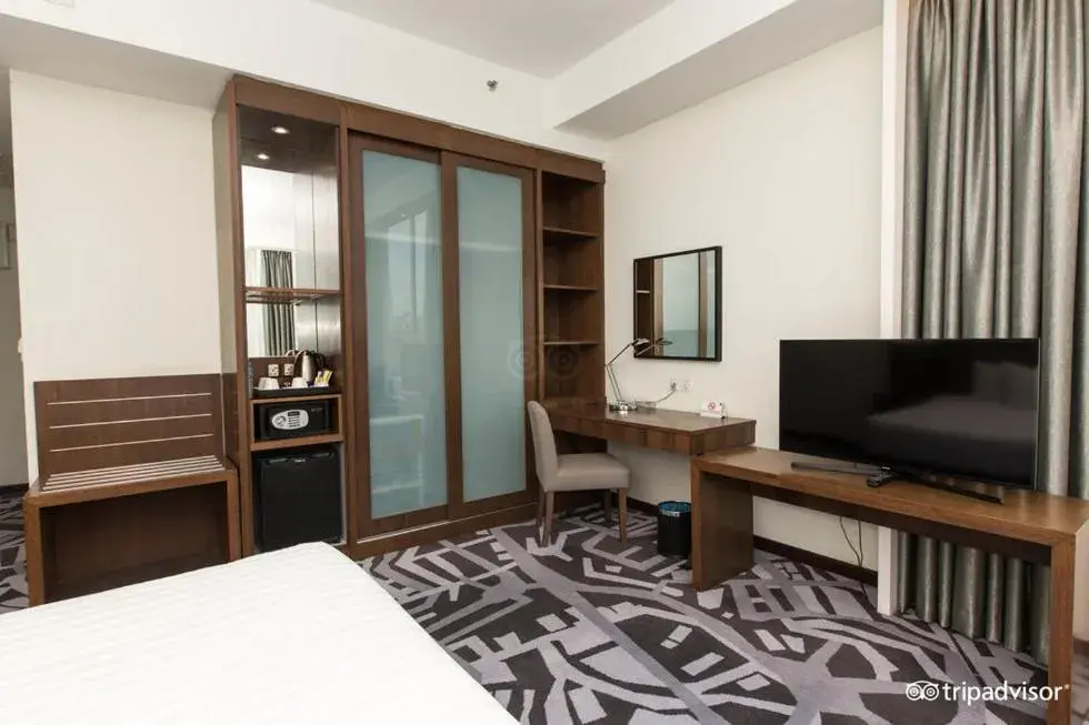 wardrobe, TV/Entertainment Center in WP Hotel