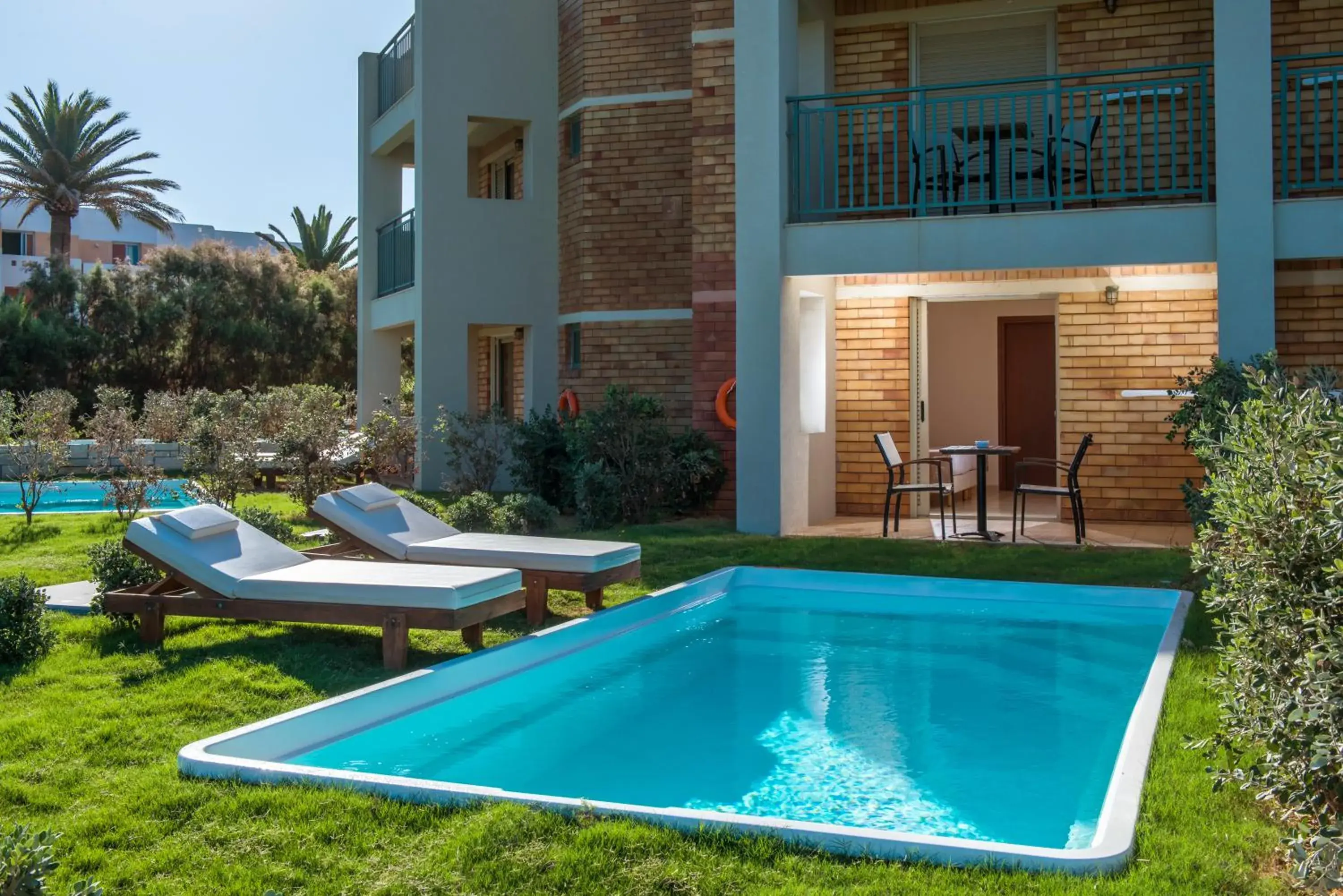 Patio, Swimming Pool in Bella Beach Hotel