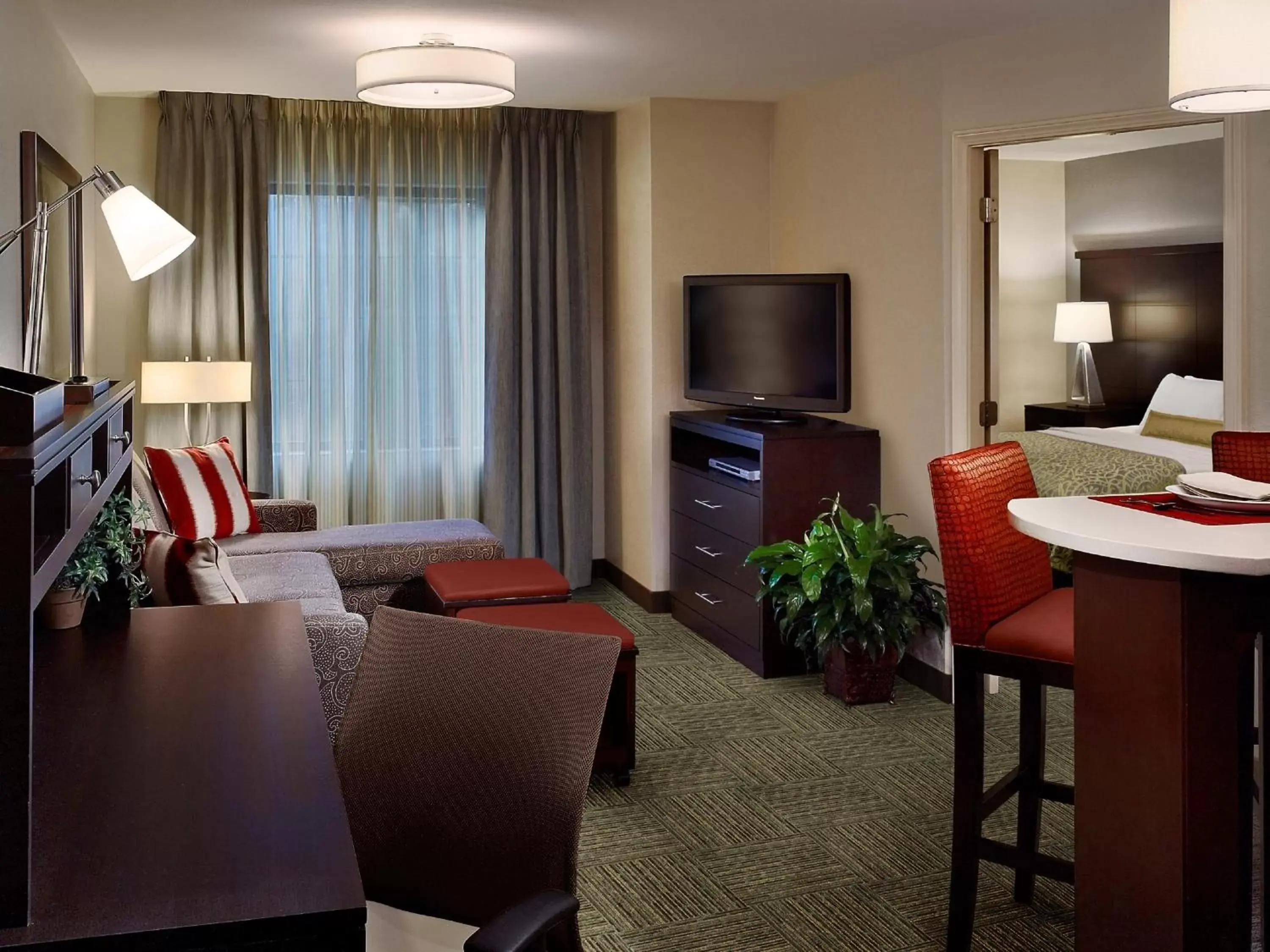 Photo of the whole room, TV/Entertainment Center in Staybridge Suites Rochester, an IHG Hotel