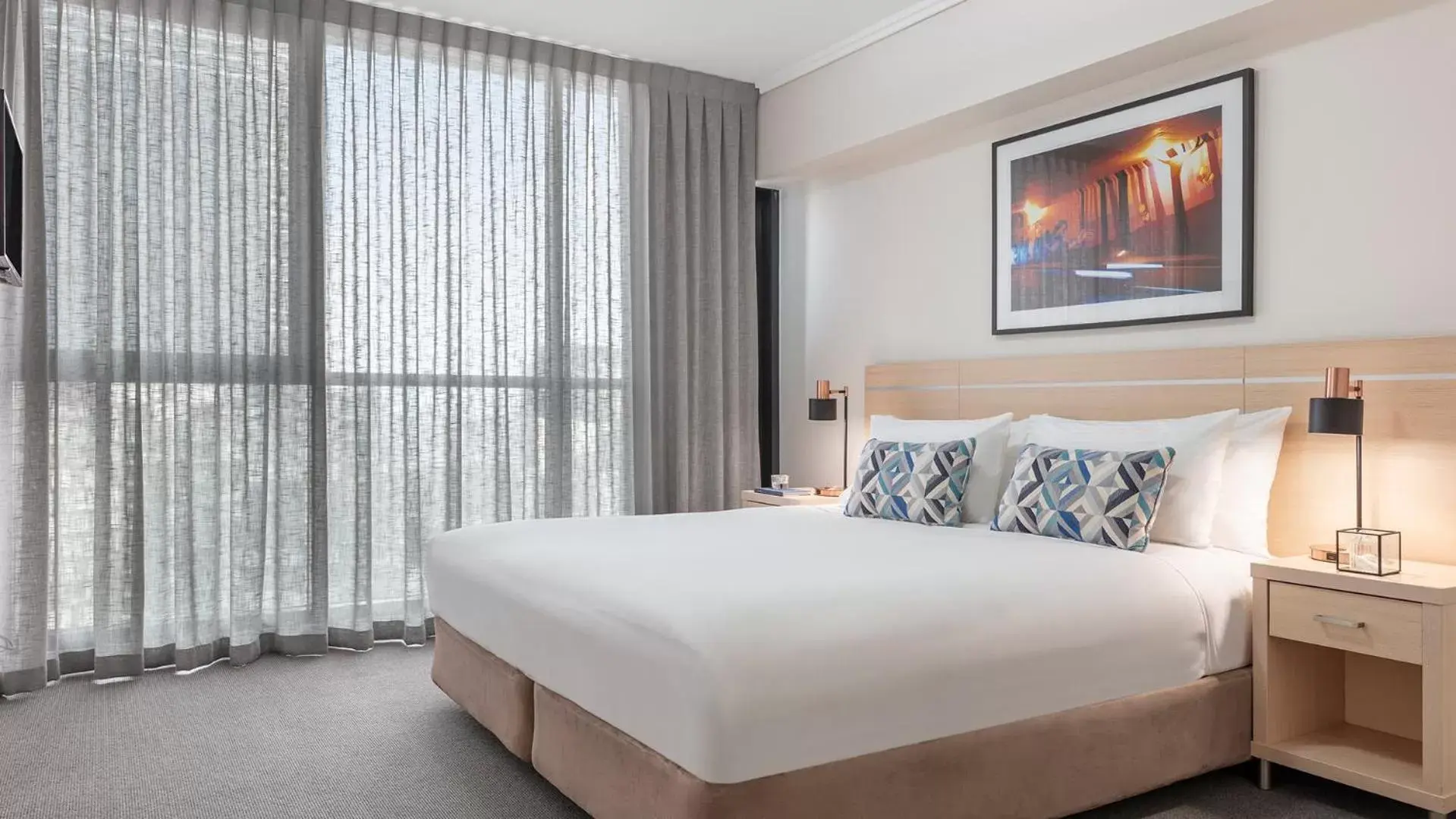 Bed in Oaks Brisbane on Charlotte Suites
