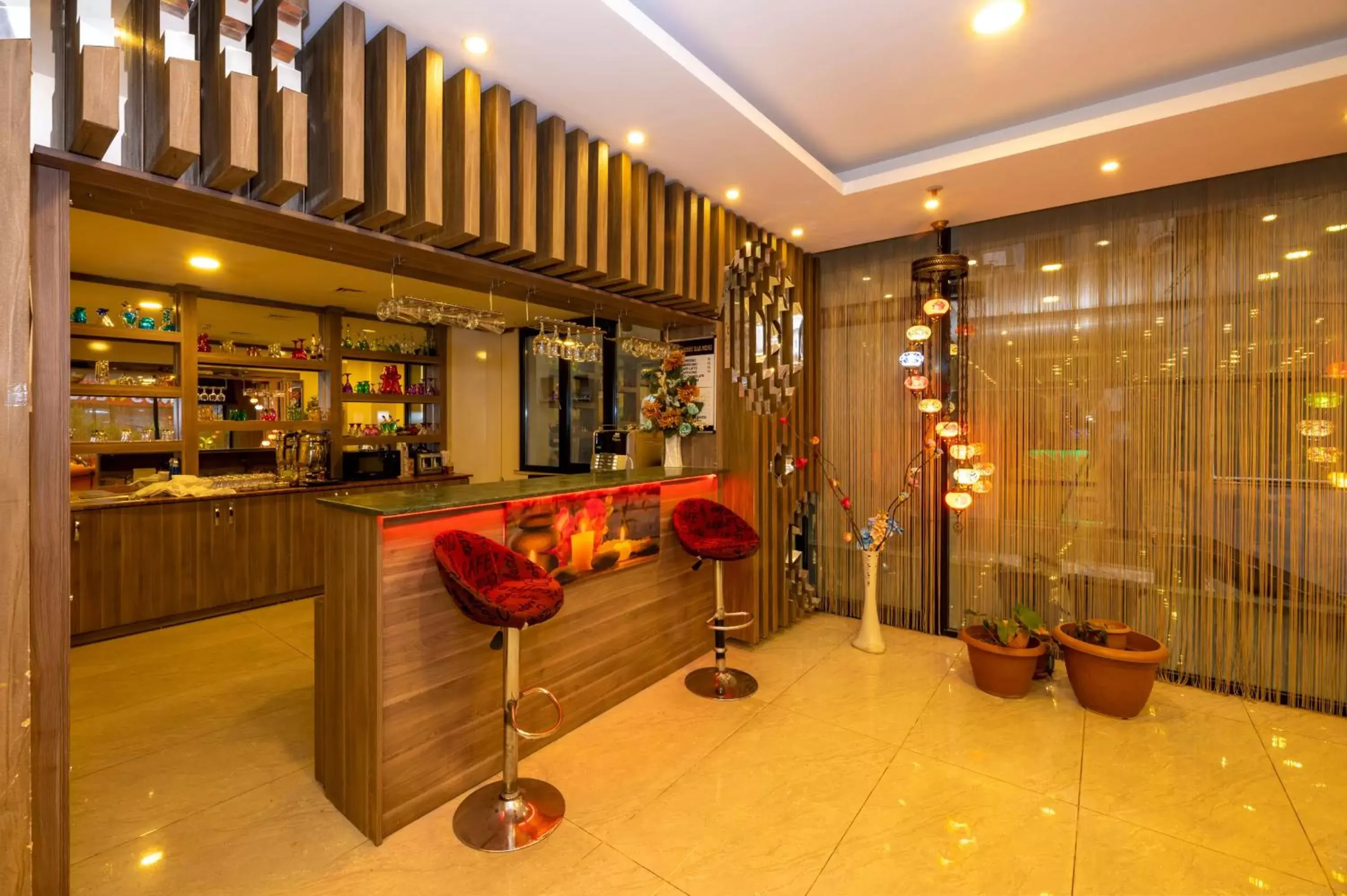 Lounge or bar in Grand Palace Hotel Lounge or bar in Grand Palace Hotel