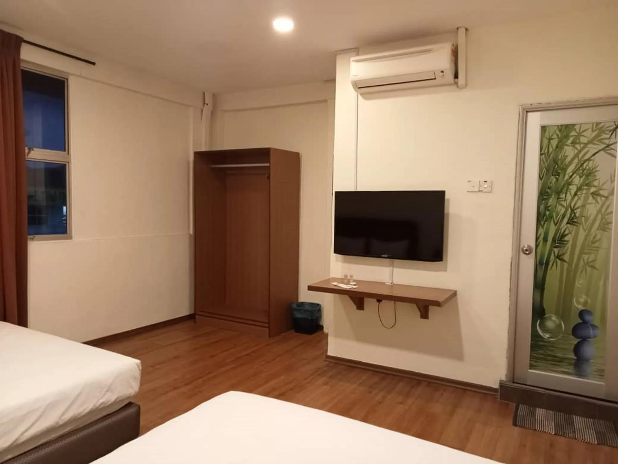 Bed in I Harmony Hotel