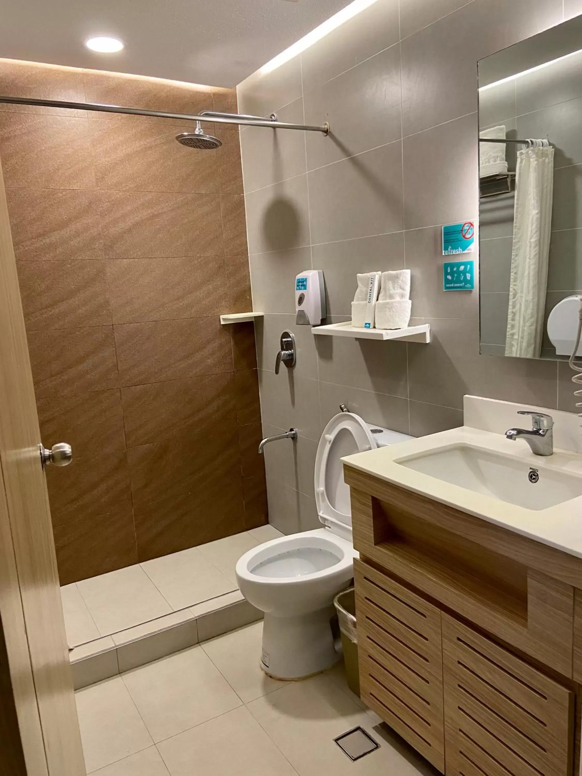 Bathroom in Microtel by Wyndham Tarlac