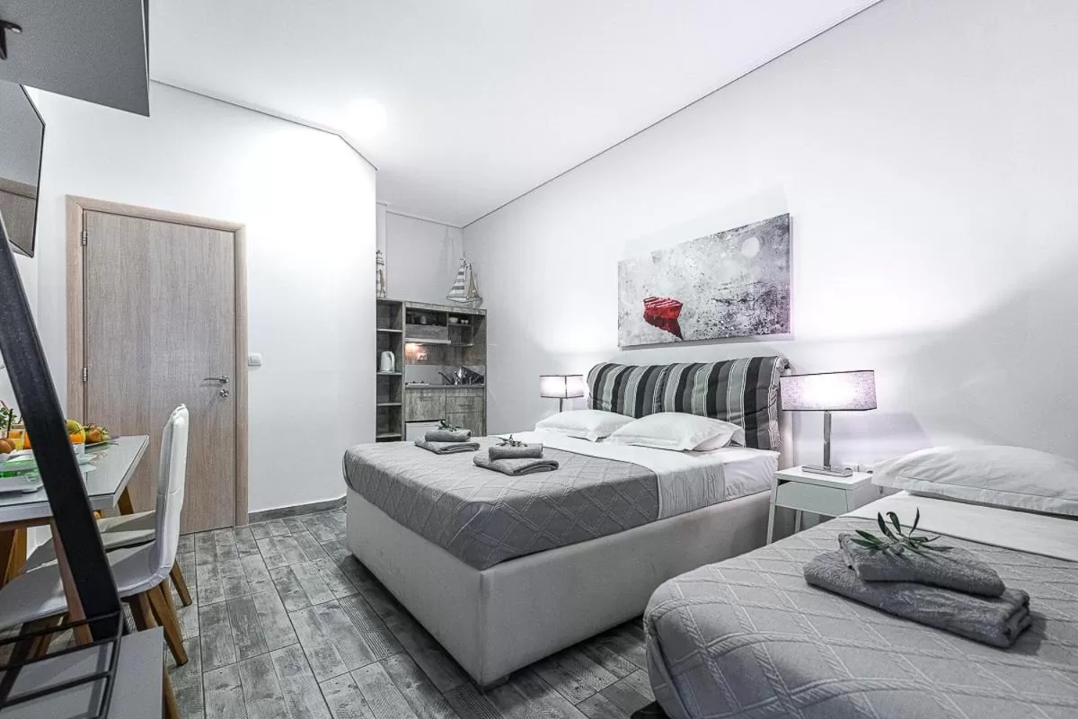 Photo of the whole room, Bed in Comfort Stay Athens Airport Hotel - FREE shuttle from and to the airport