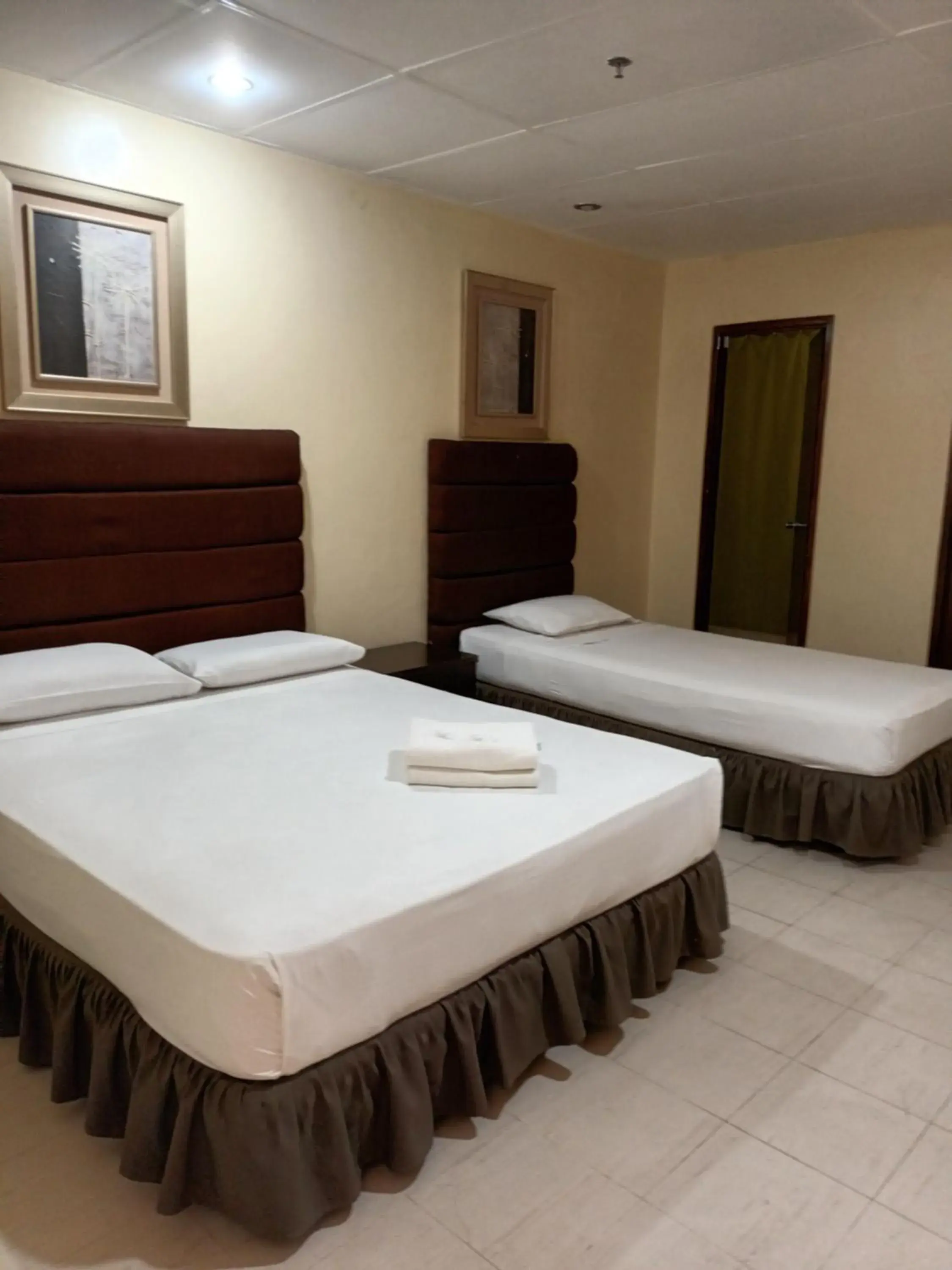 Bed in Mactan Pension House