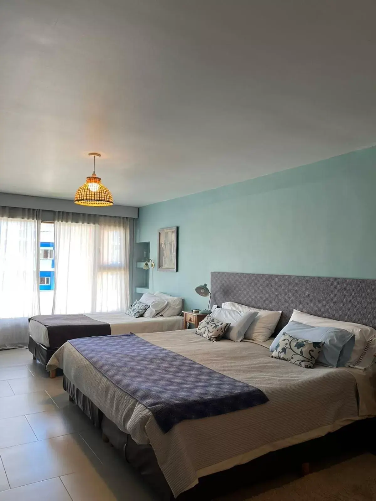Bed in Las Bayas Home Suites