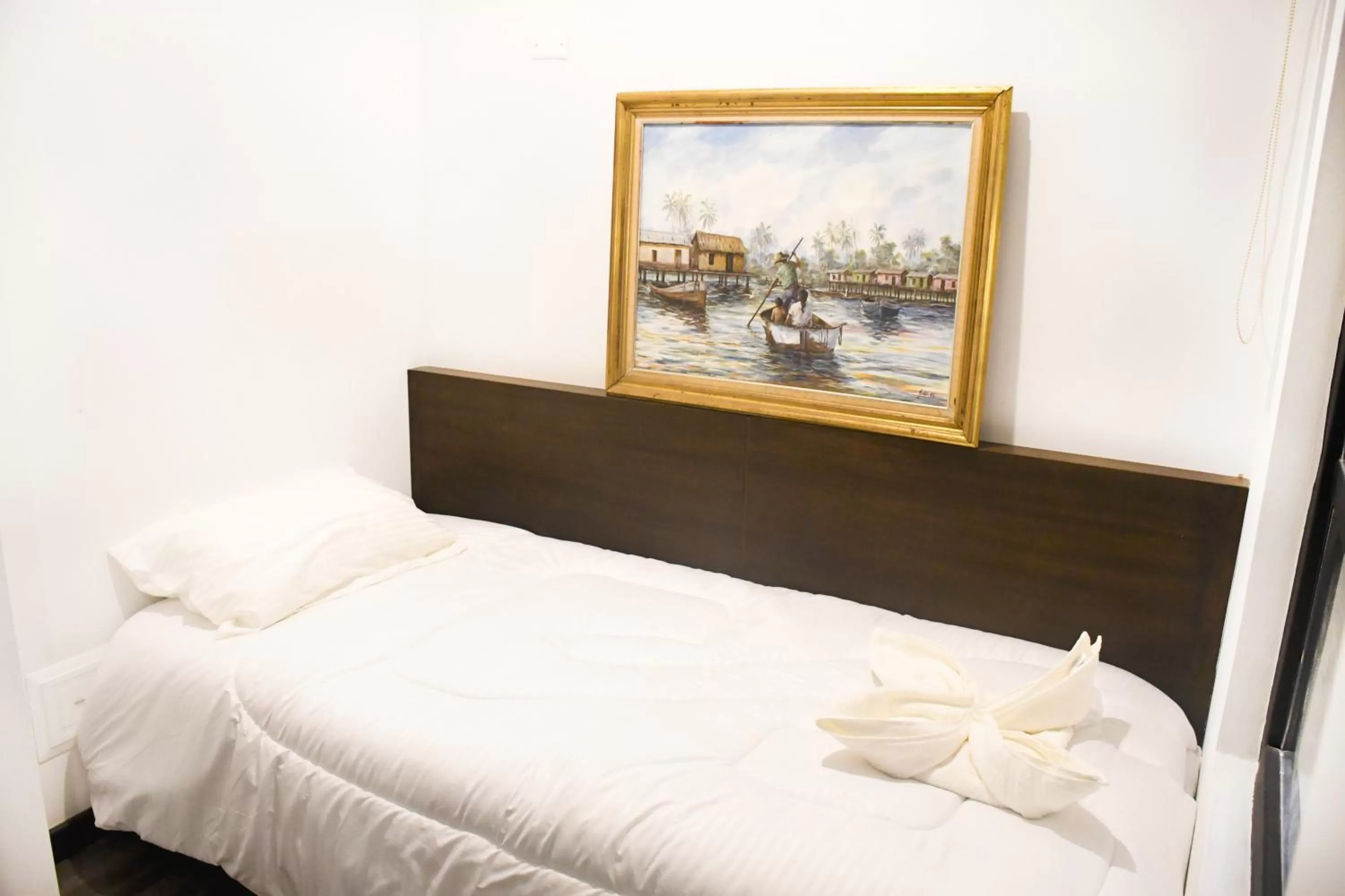 Bed in Hotel Museo San Moritz