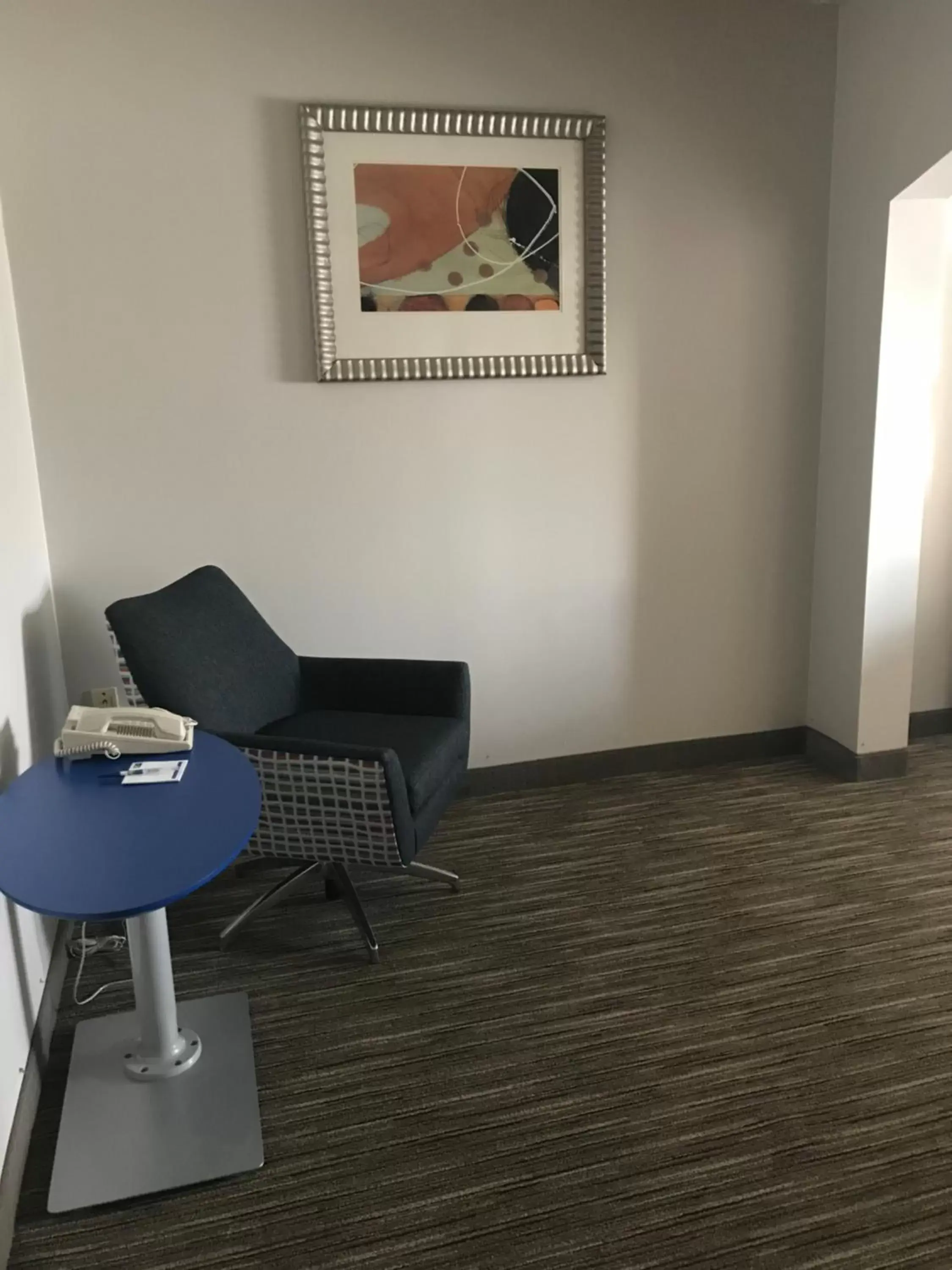 Seating area in Holiday Inn Express Hotel & Suites Louisville East, an IHG Hotel