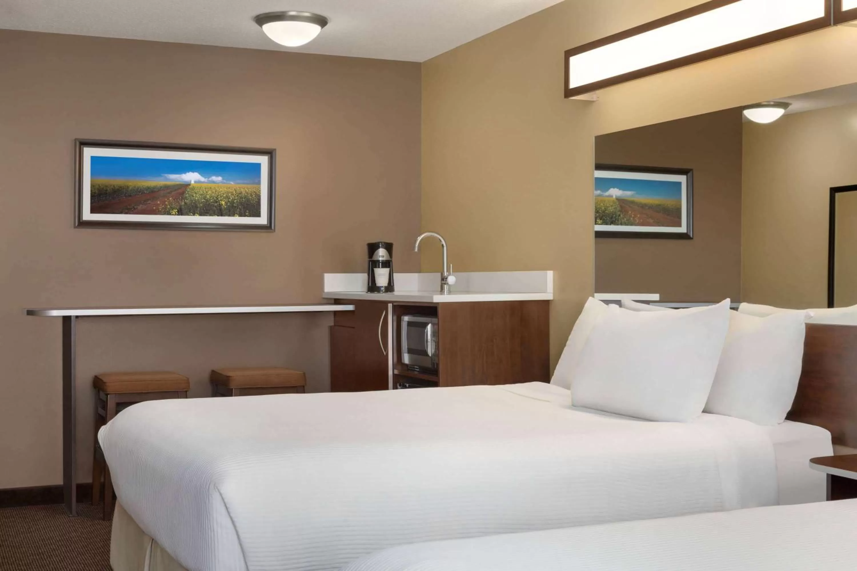 Photo of the whole room, Bed in Microtel Inn & Suites by Wyndham Estevan