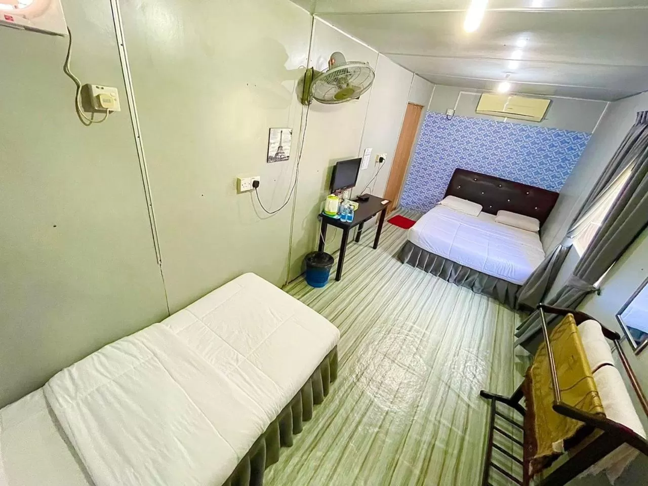 Toilet, Bed in DGeting Beach Resort