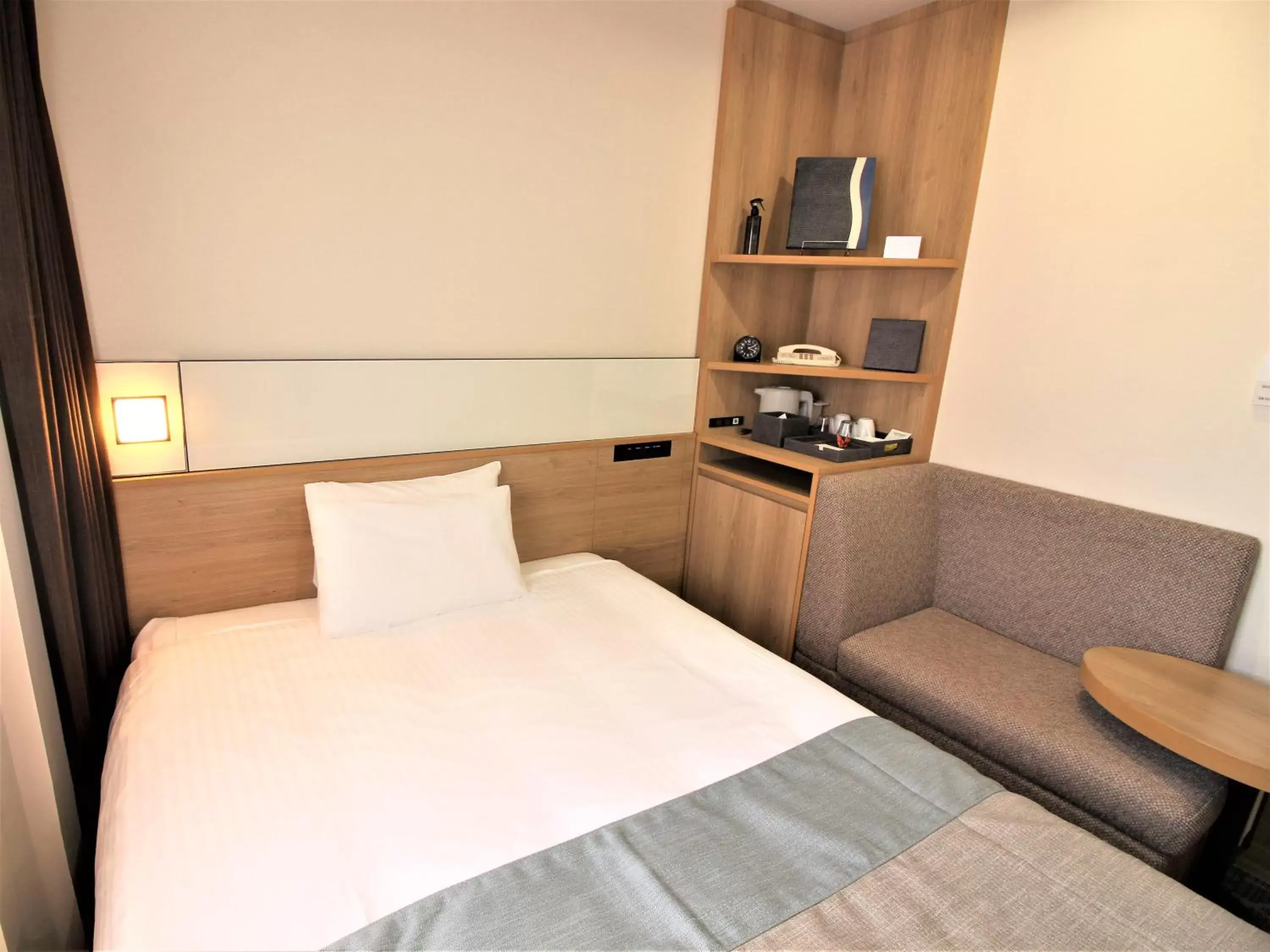 Bedroom, Bed in Hotel Hokke Club Naha Shintoshin