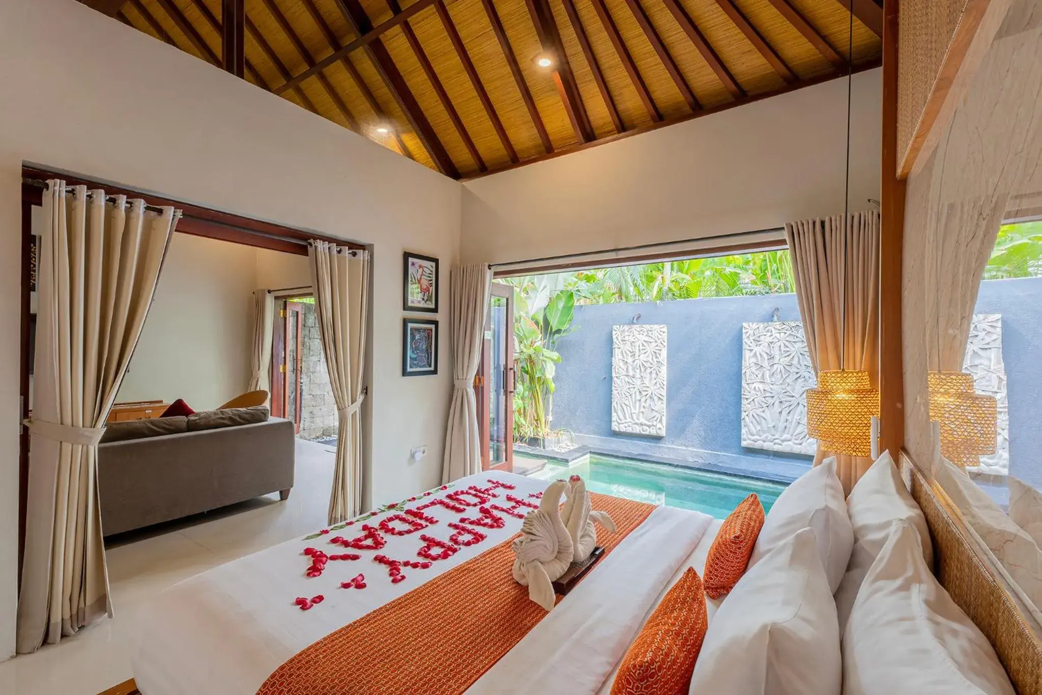 Bedroom, TV/Entertainment Center in Seminyak Sanctuary Villa by Ini Vie Hospitality