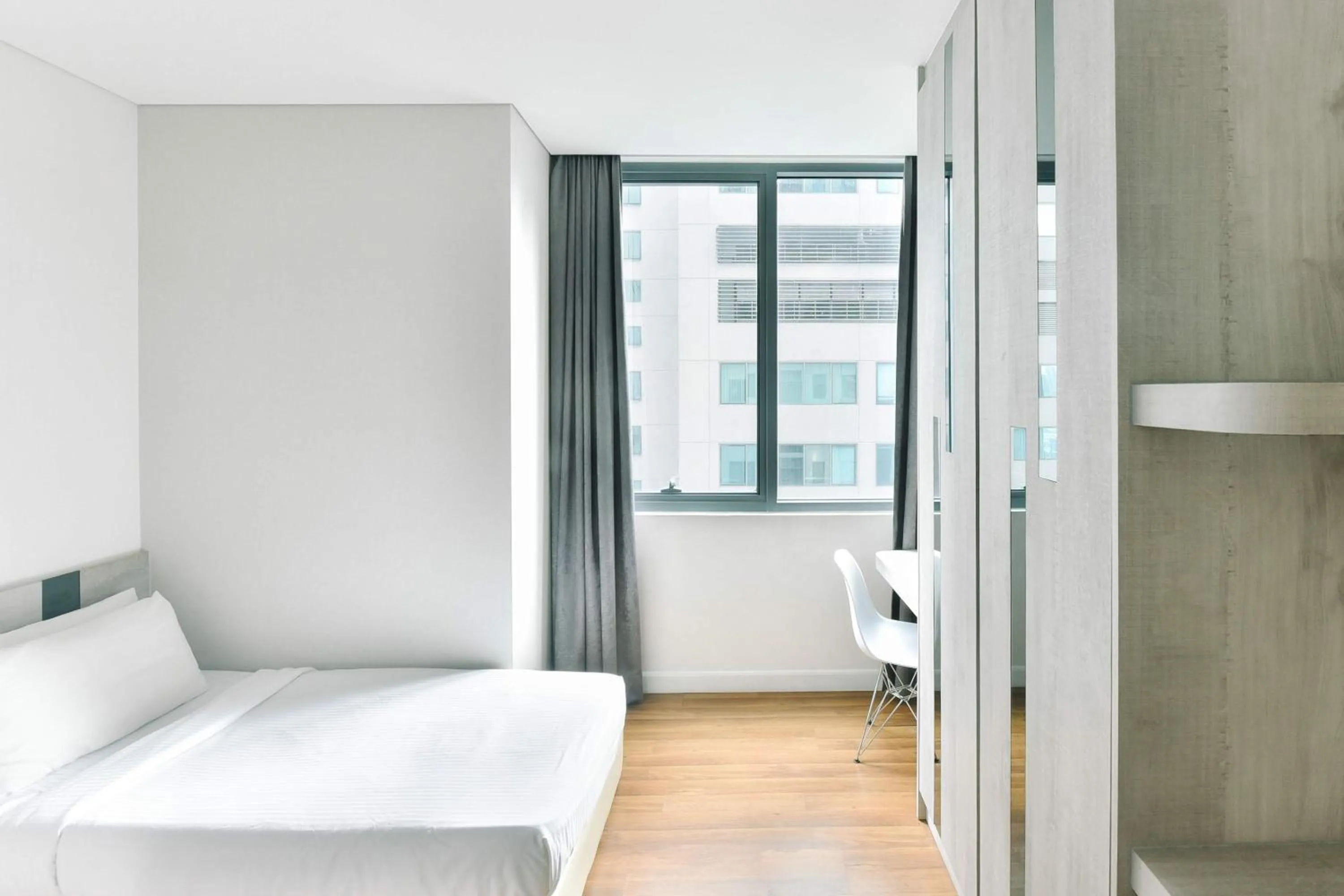 Bedroom in Summer Suites Residences by Subhome