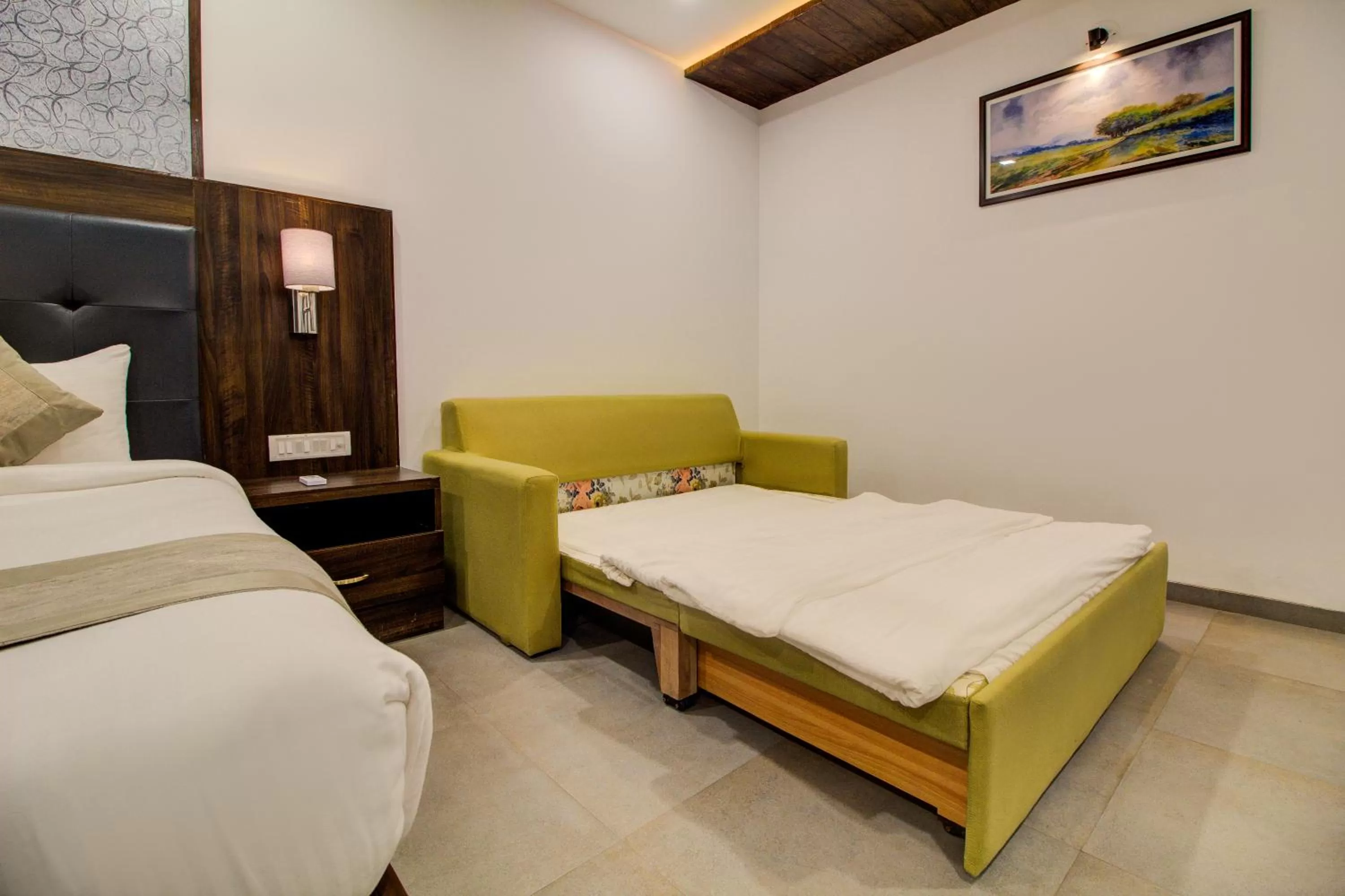 Bed in Mountain Breeze Resort, Mahabaleshwar