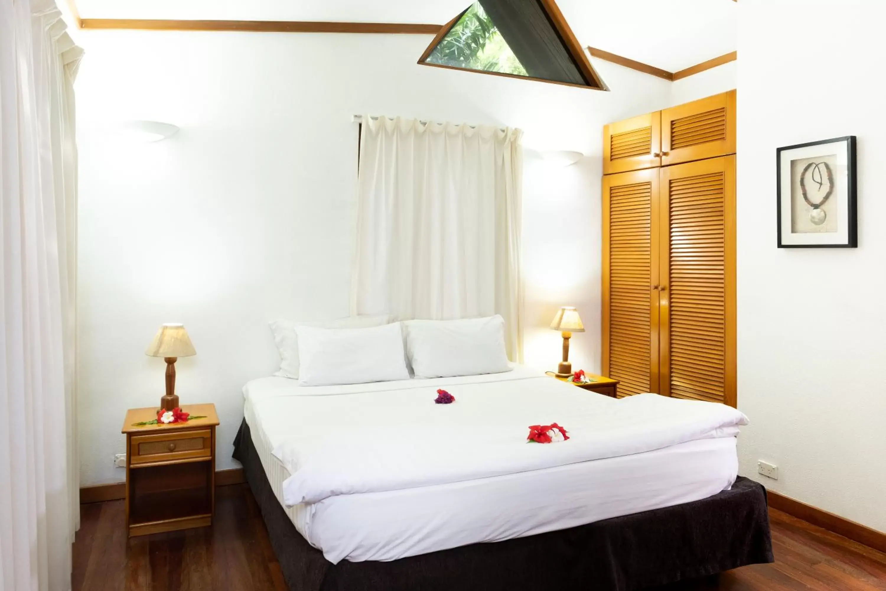 Bedroom, Bed in First Landing Beach Resort & Villas