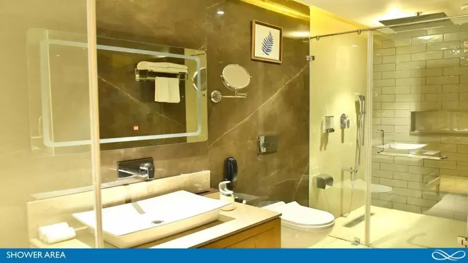 Shower, Bathroom in Sarovar Portico Morbi