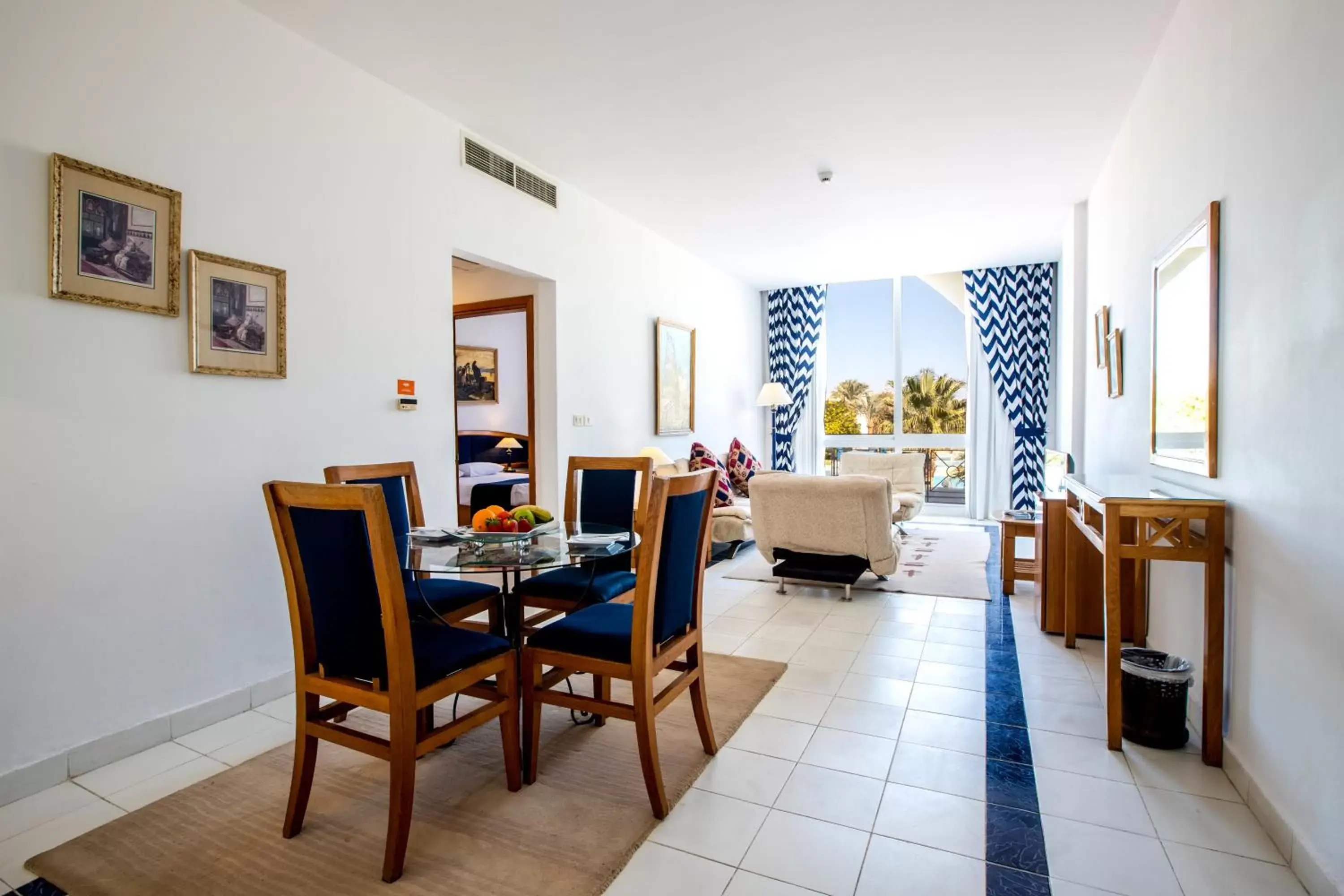 Living room, Dining Area in Desert Rose Resort