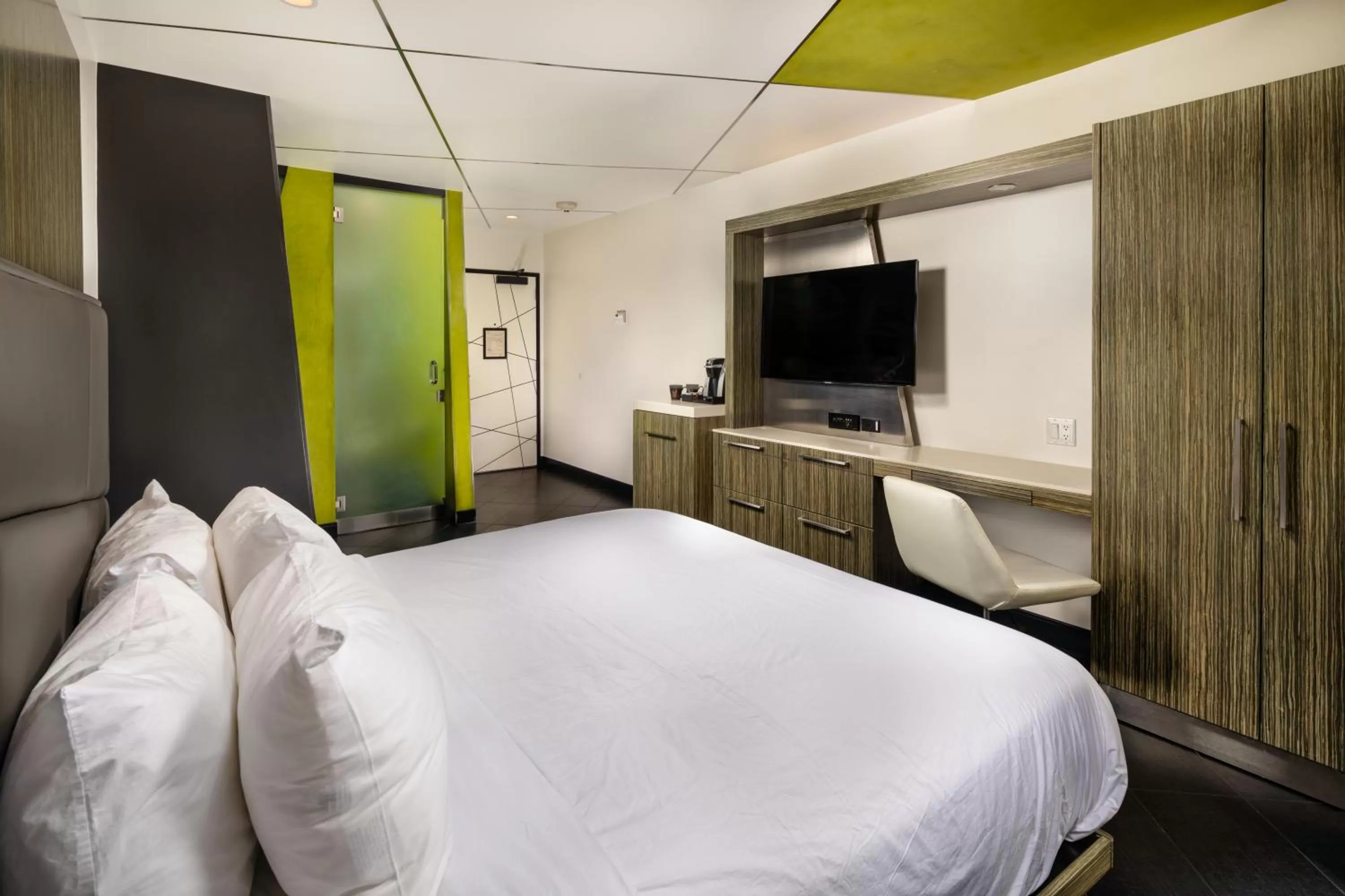 Bed in The Moment Hotel