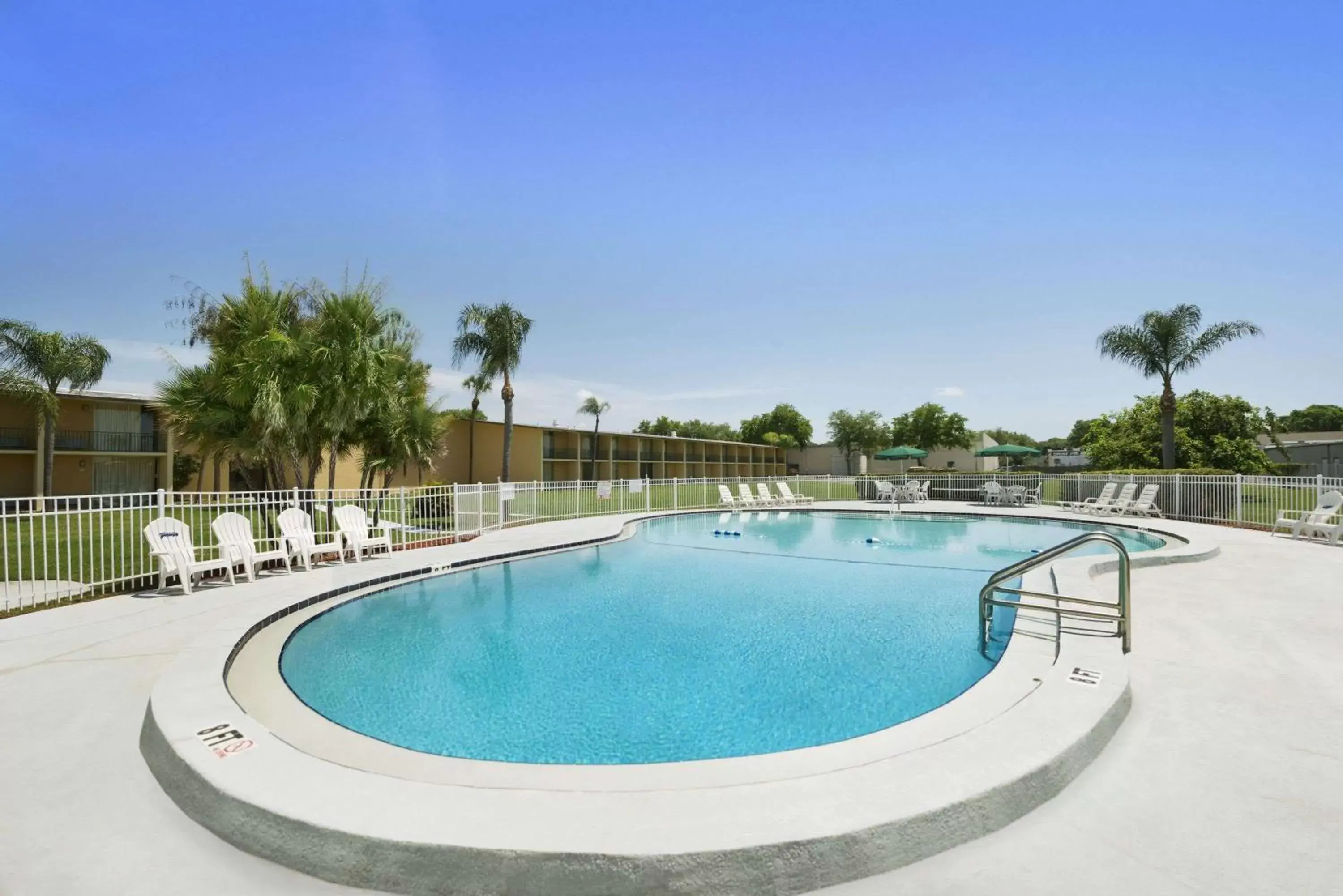 On site, Swimming Pool in Howard Johnson by Wyndham Winter Haven FL