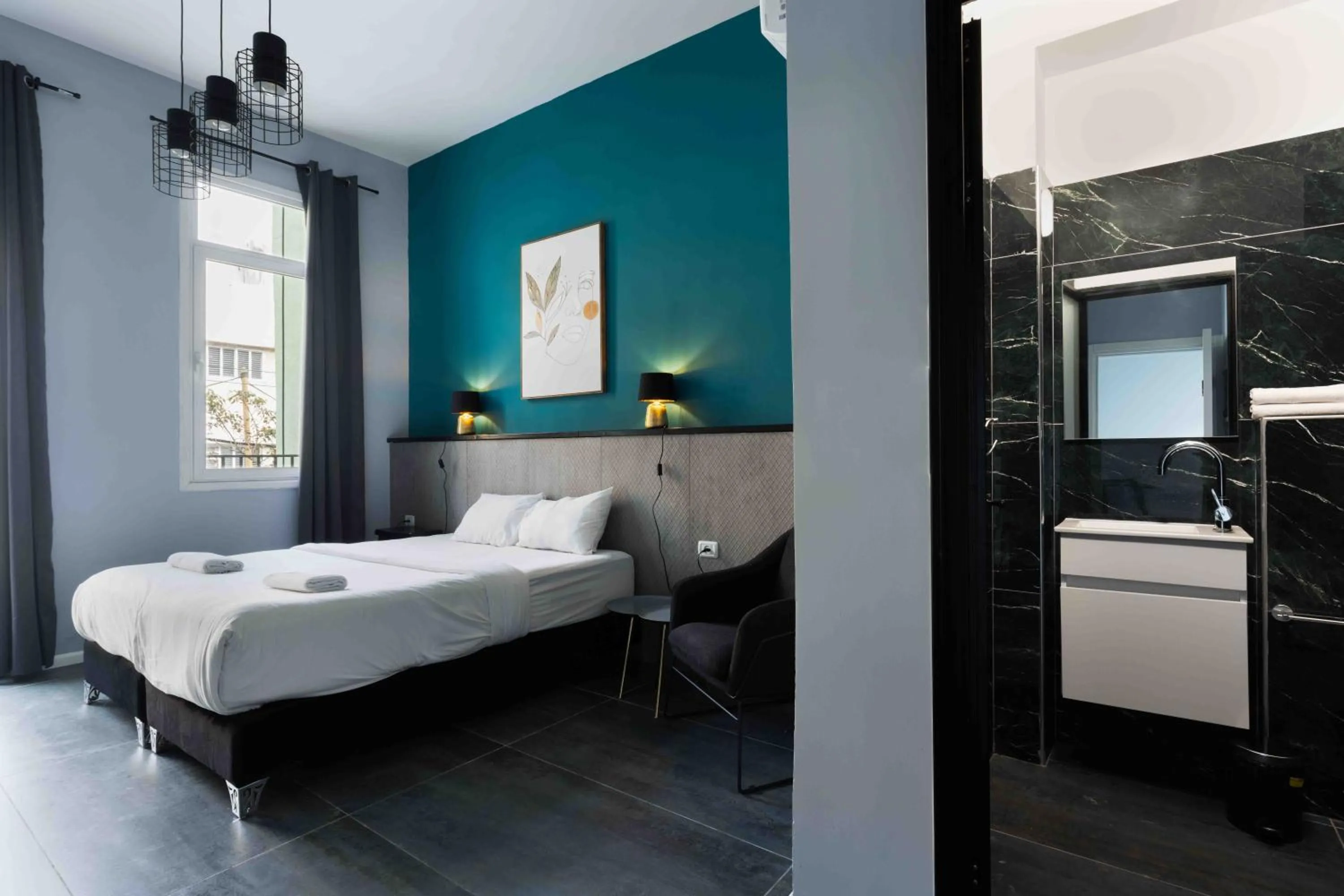 Bedroom, Bed in Liber Tel Aviv Sea Shore Suites BY RAPHAEL HOTELS