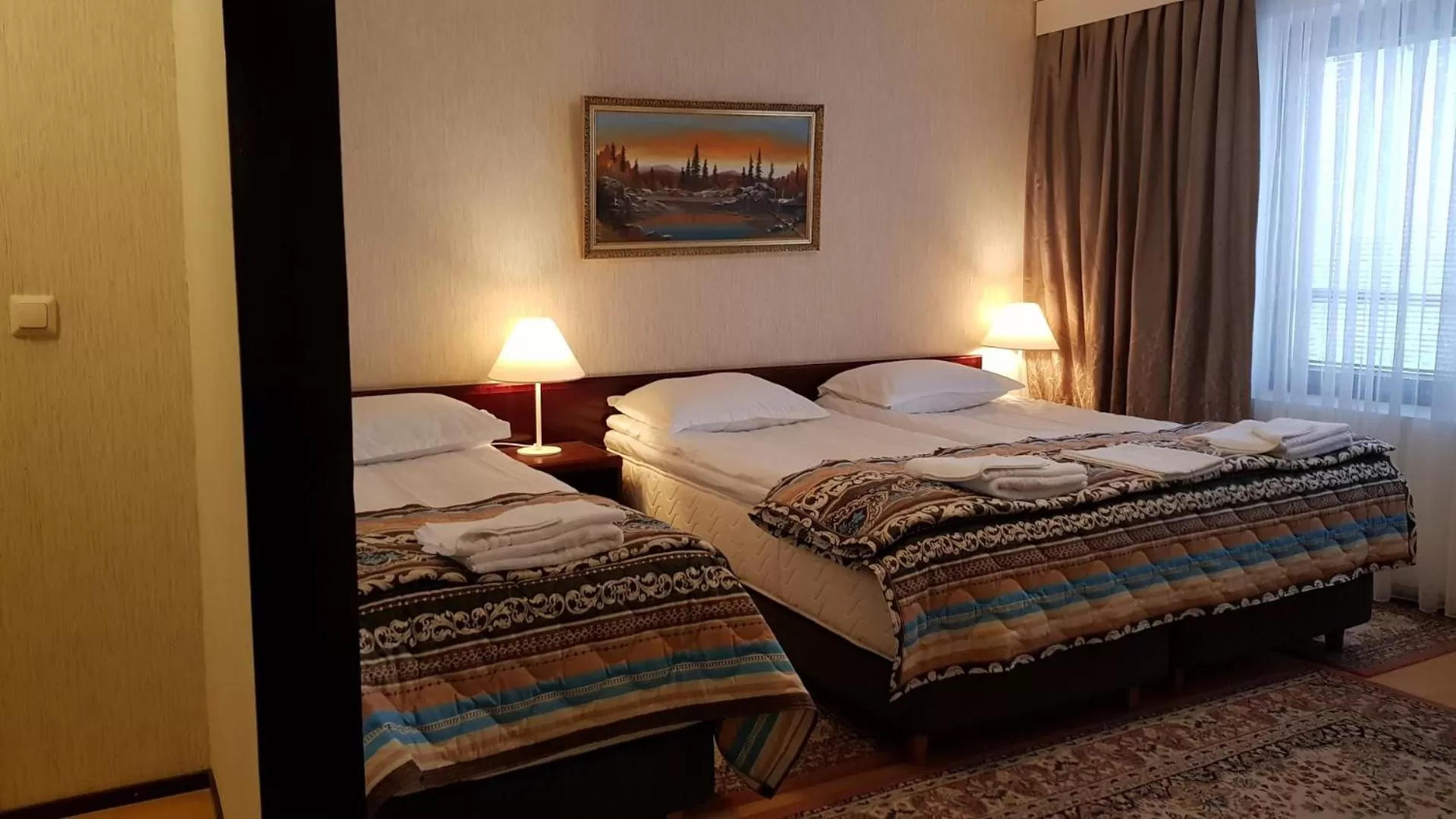 Bed in Hotelli Sandels