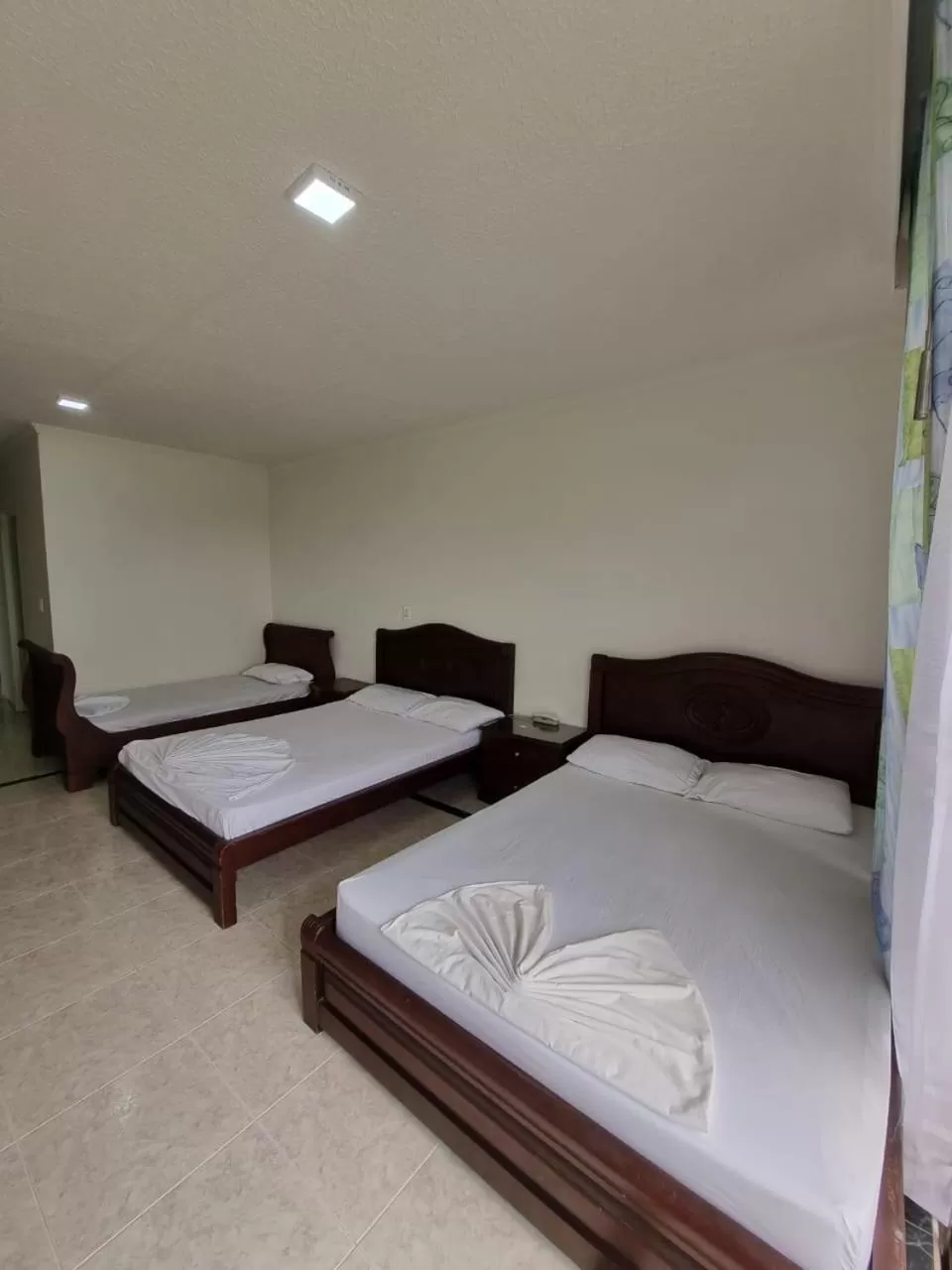 Bed in Zahira Hotel Melgar