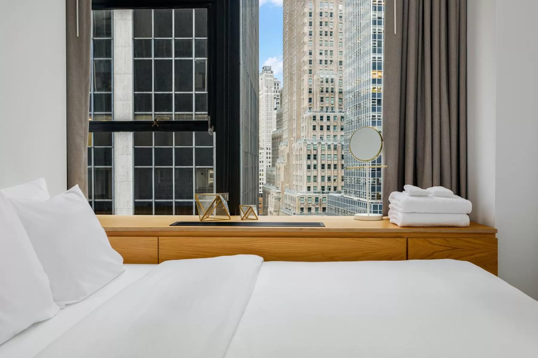Bed in Placemakr Wall Street
