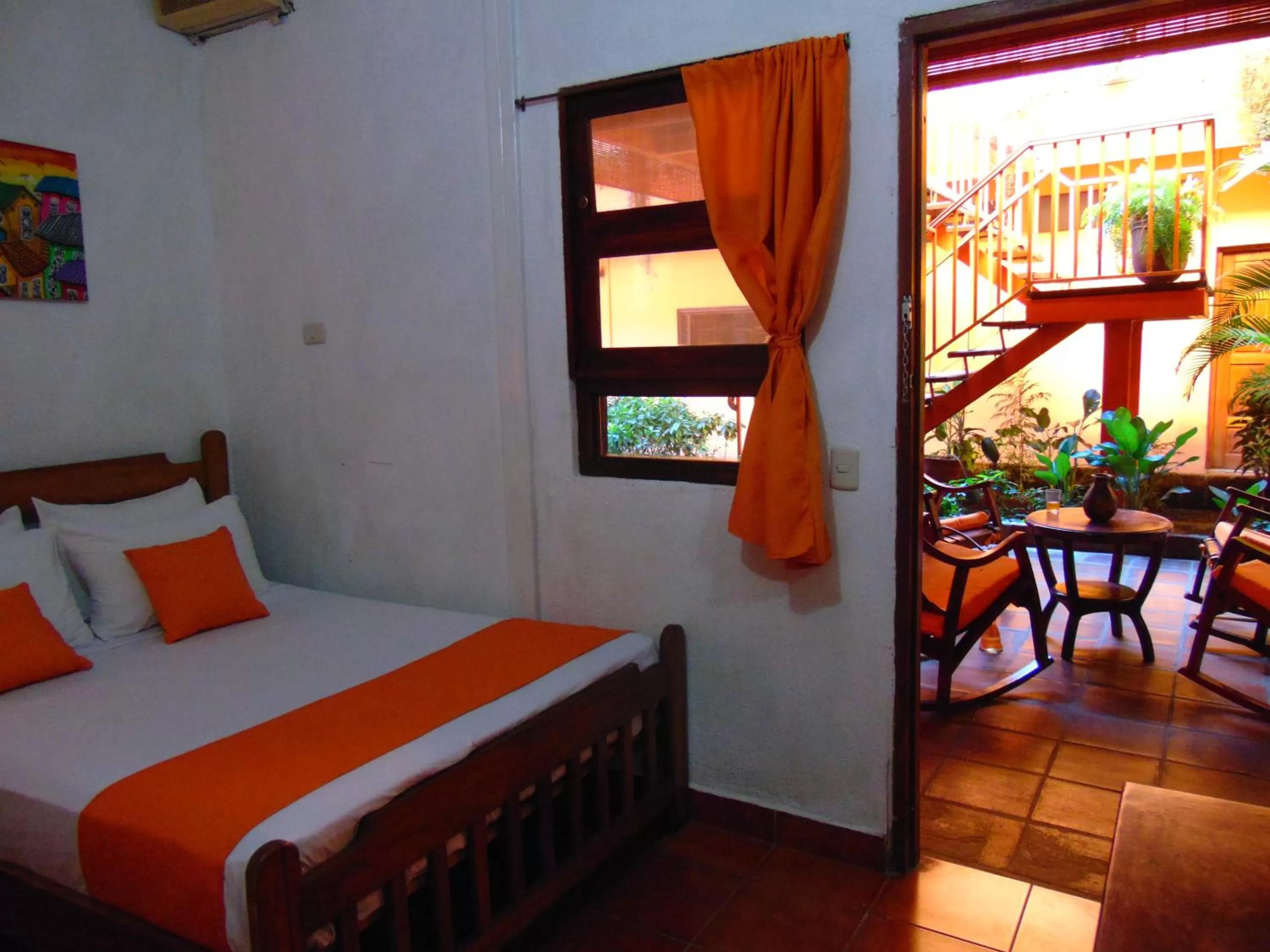 Garden view, Bed in Hotel El Maltese