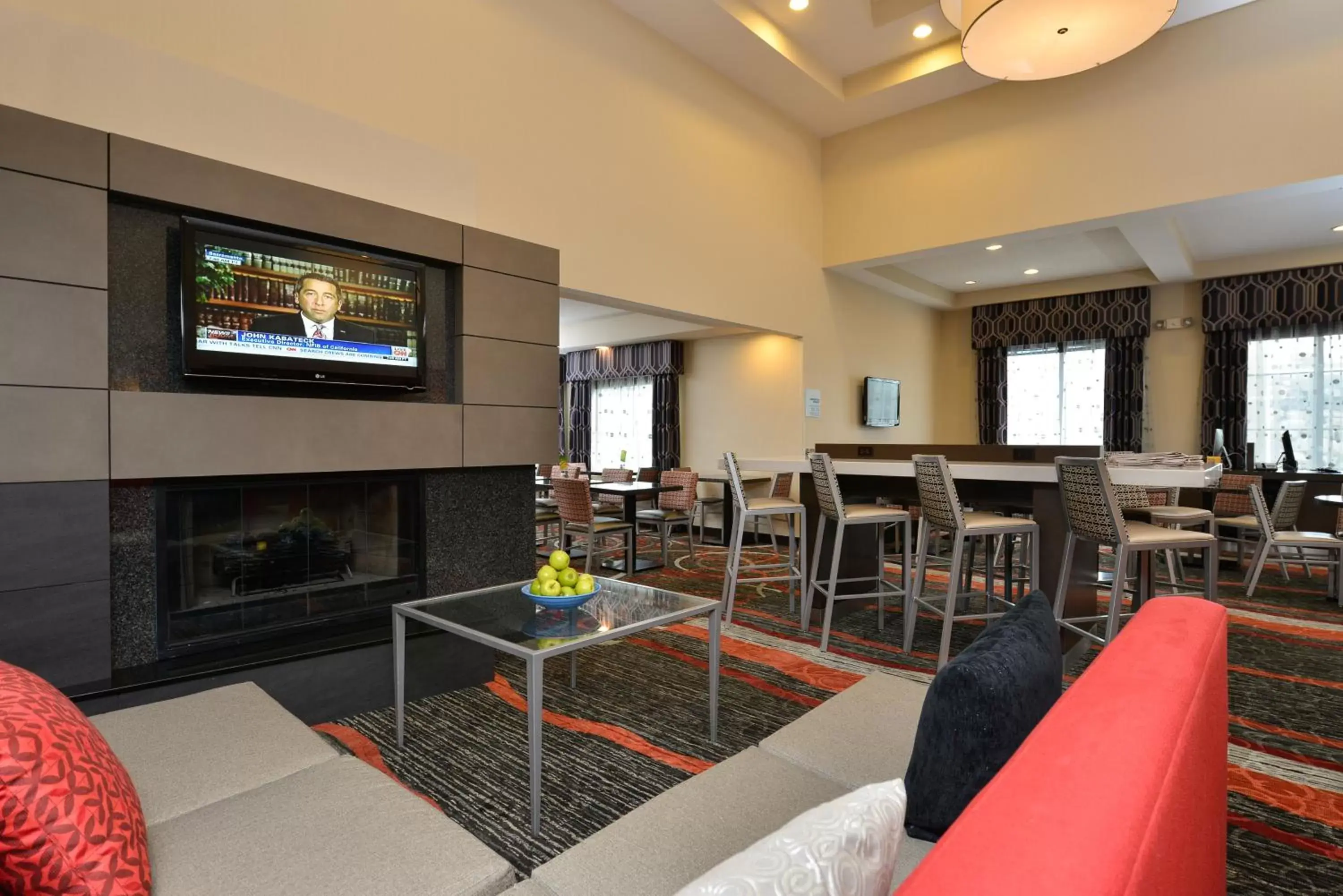 Communal lounge/ TV room in Holiday Inn Express Boston/Milford Hotel, an IHG Hotel