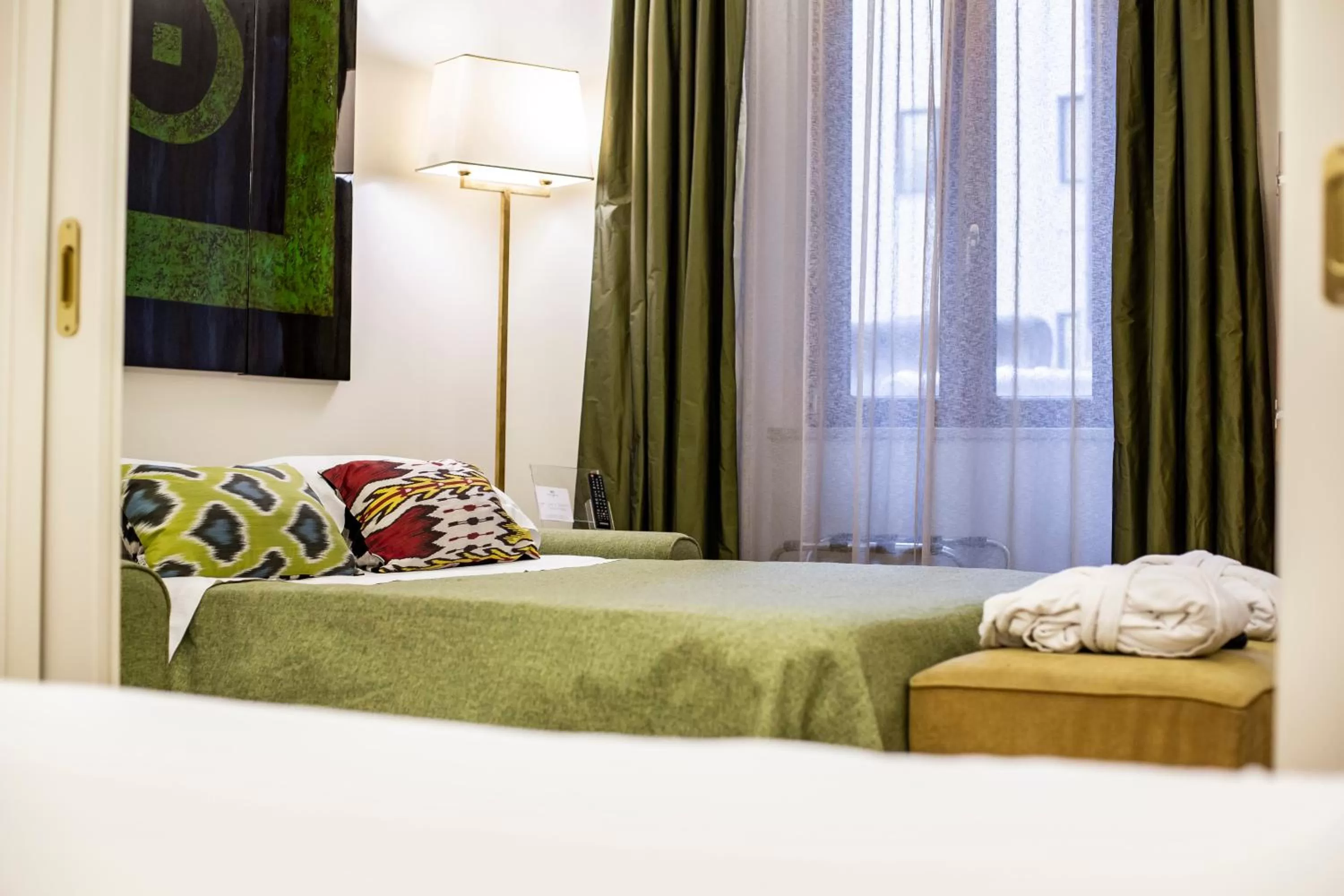 Bed in Hotel Adriano