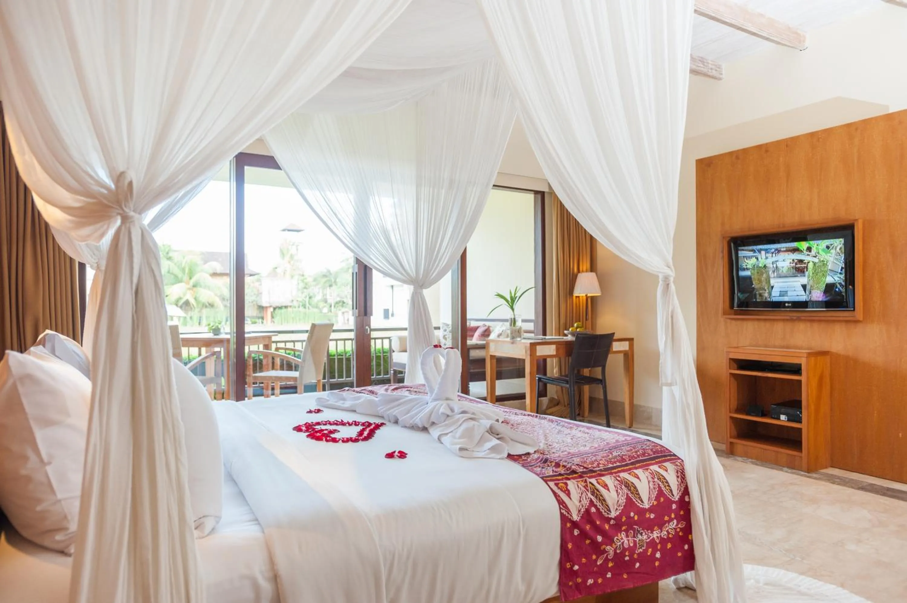 Bed in Komaneka at Monkey Forest Ubud