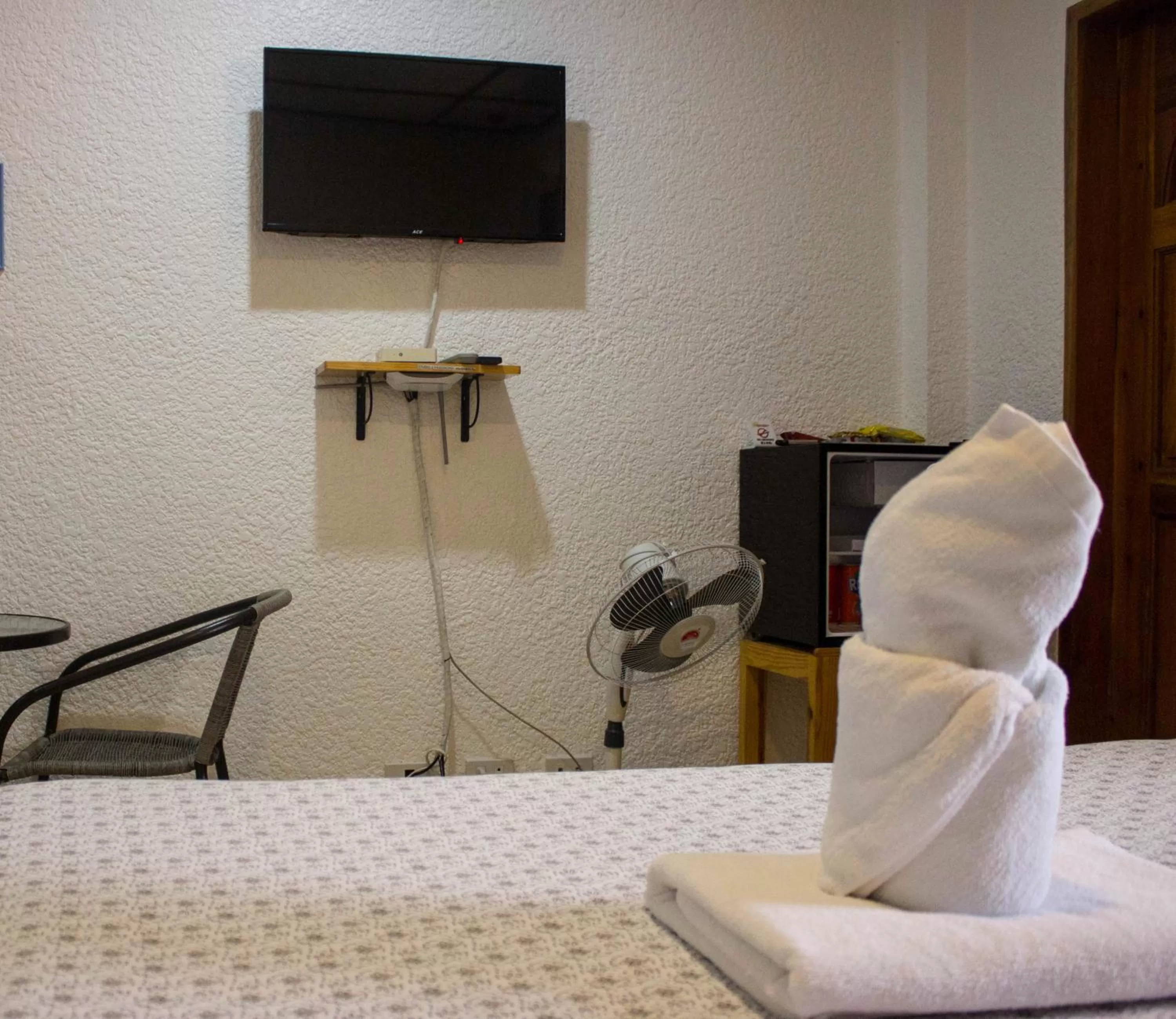 TV/Entertainment Center in Jugalis Hotel and Restaurant