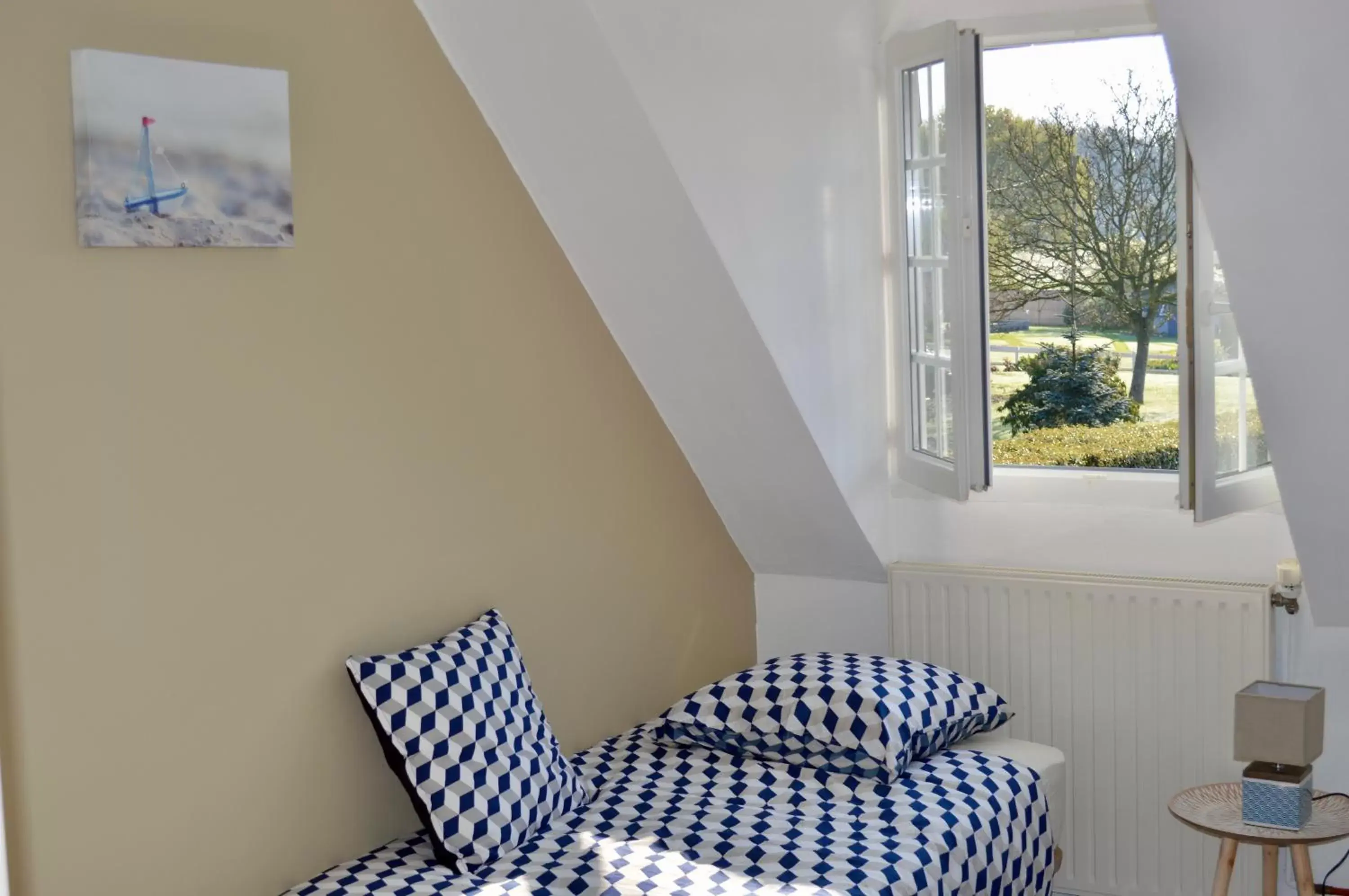 Bed, Seating Area in La Pichonnière