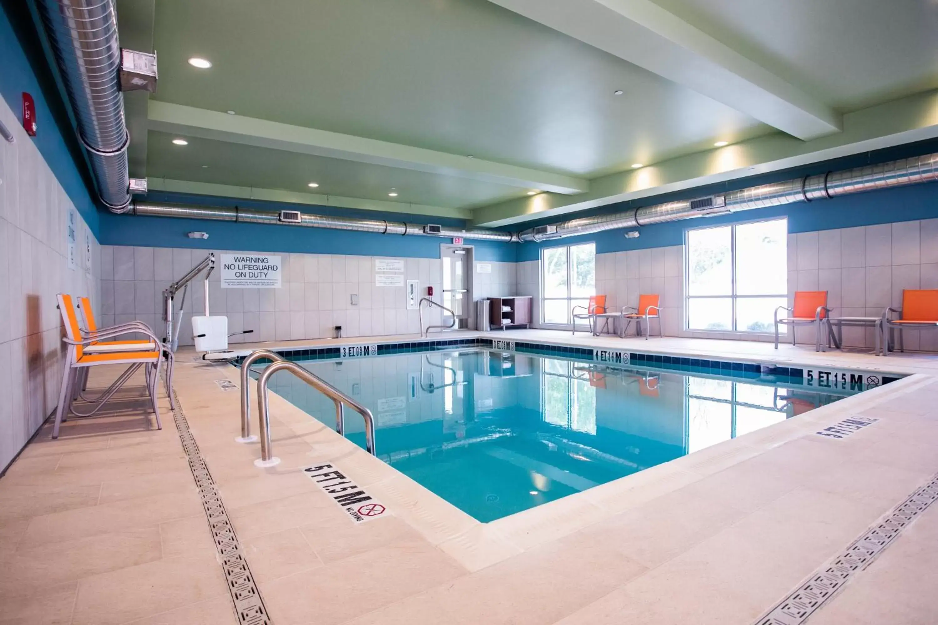 Swimming Pool in Holiday Inn Express & Suites Rehoboth Beach, an IHG Hotel