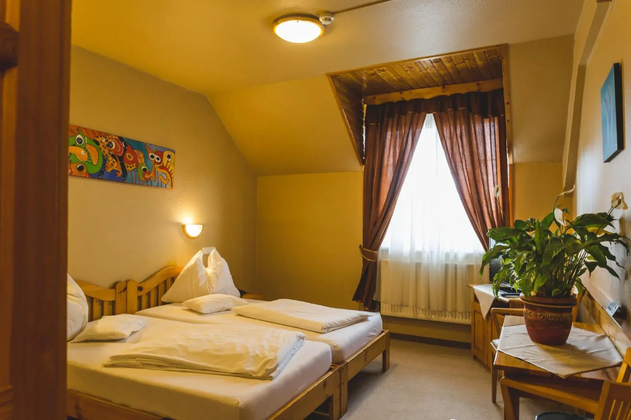 Bed in Hotel Karin